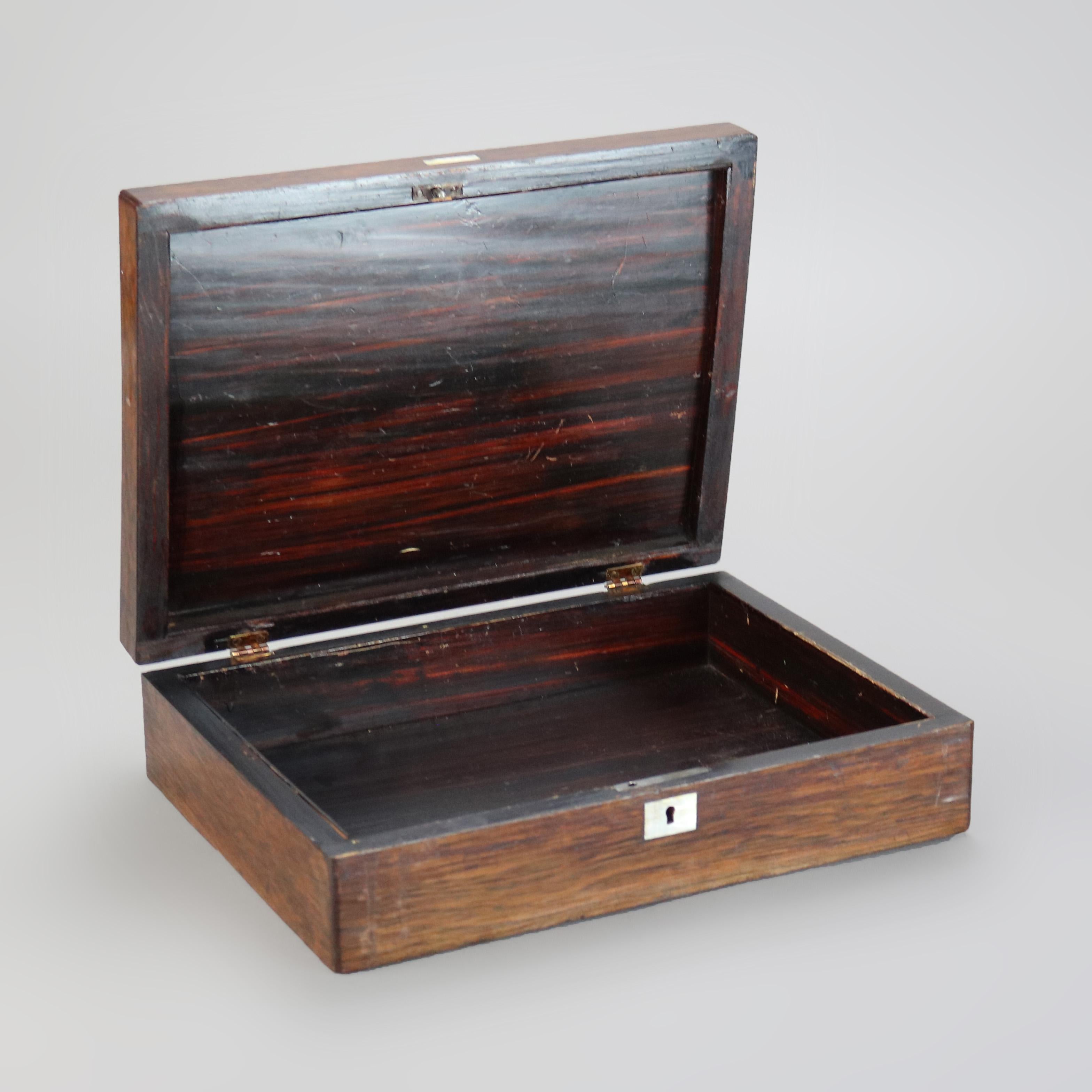 Antigua caja de lotería victoriana de palisandro con incrustaciones de nácar C1890

Medidas- 3,5 