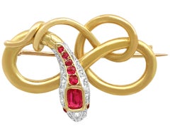 Antike viktorianische Schlangenbrosche aus 22 Karat Gelbgold mit Rubin und Diamant