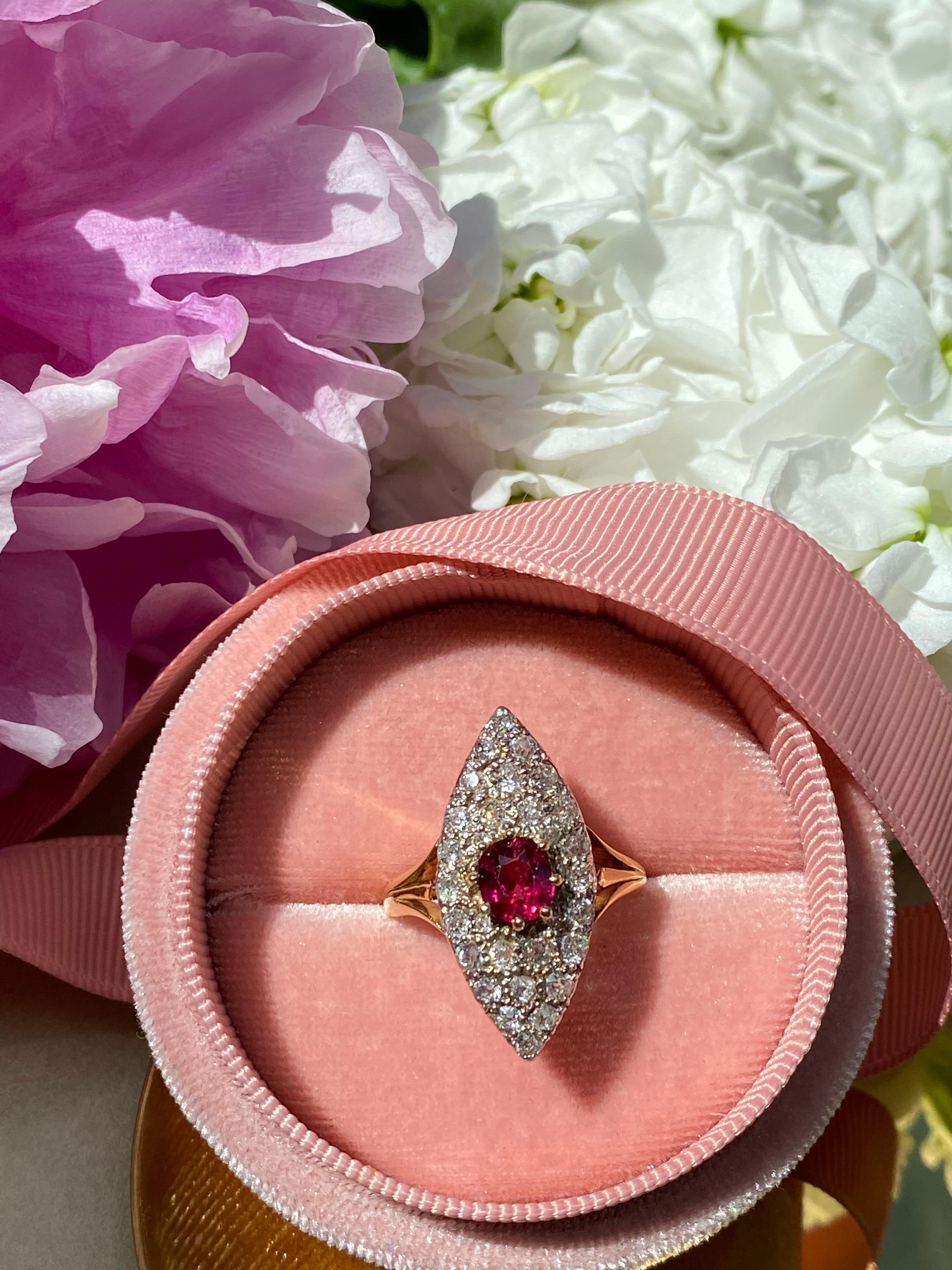 Antique Victorian Ruby and Diamond Navette Ring. Ruby is approx 0.7cts and approx 1.1cts of old cut diamonds set in 18ct gold. Size 7.5/0 1/2, but can be resized. The face measures 28x17mm.