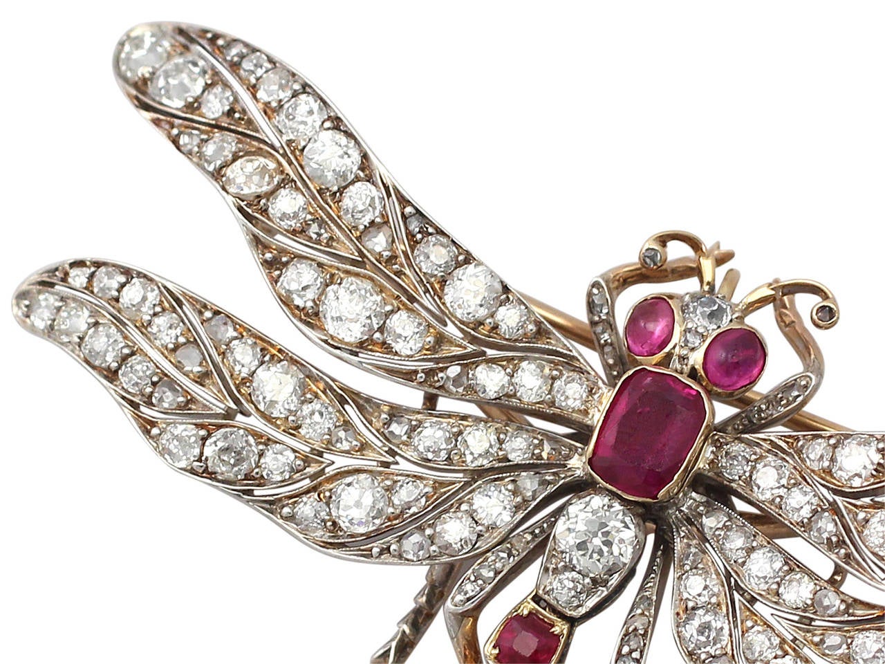 A large, stunning, fine and impressive antique 5.70 carat diamond and 3.30 carat ruby, 9 karat yellow gold dragonfly brooch; part of our antique jewelry and collections.

This stunning, large antique Victorian brooch has been modelled in 9k yellow