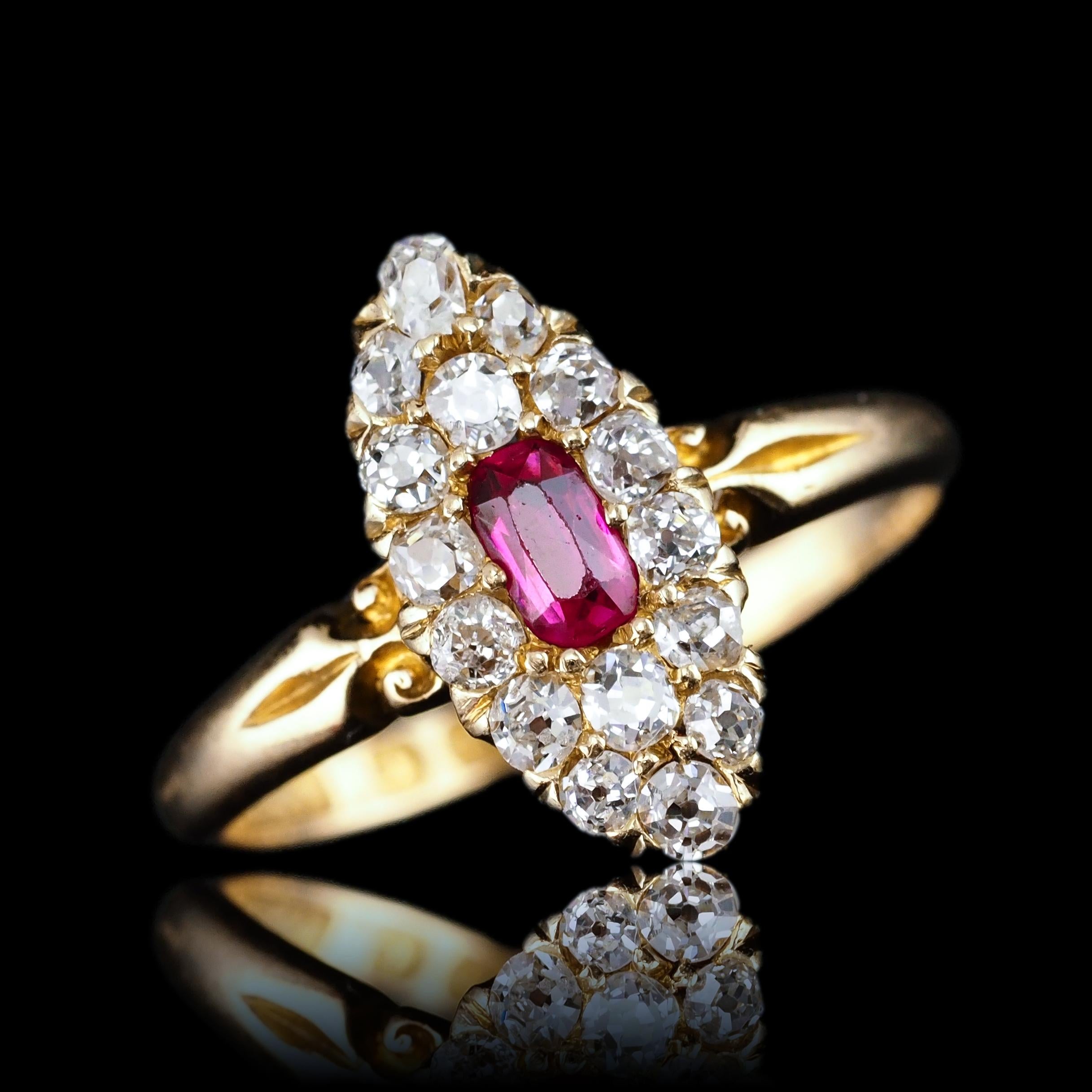 We are delighted to offer this superb Victorian 18ct gold ruby and diamond navette ring made in Birmingham in 1886 by G.Bro.
 
Distinctly Victorian and distinguished from contemporary pieces, this gorgeous piece presents one central ruby encompassed