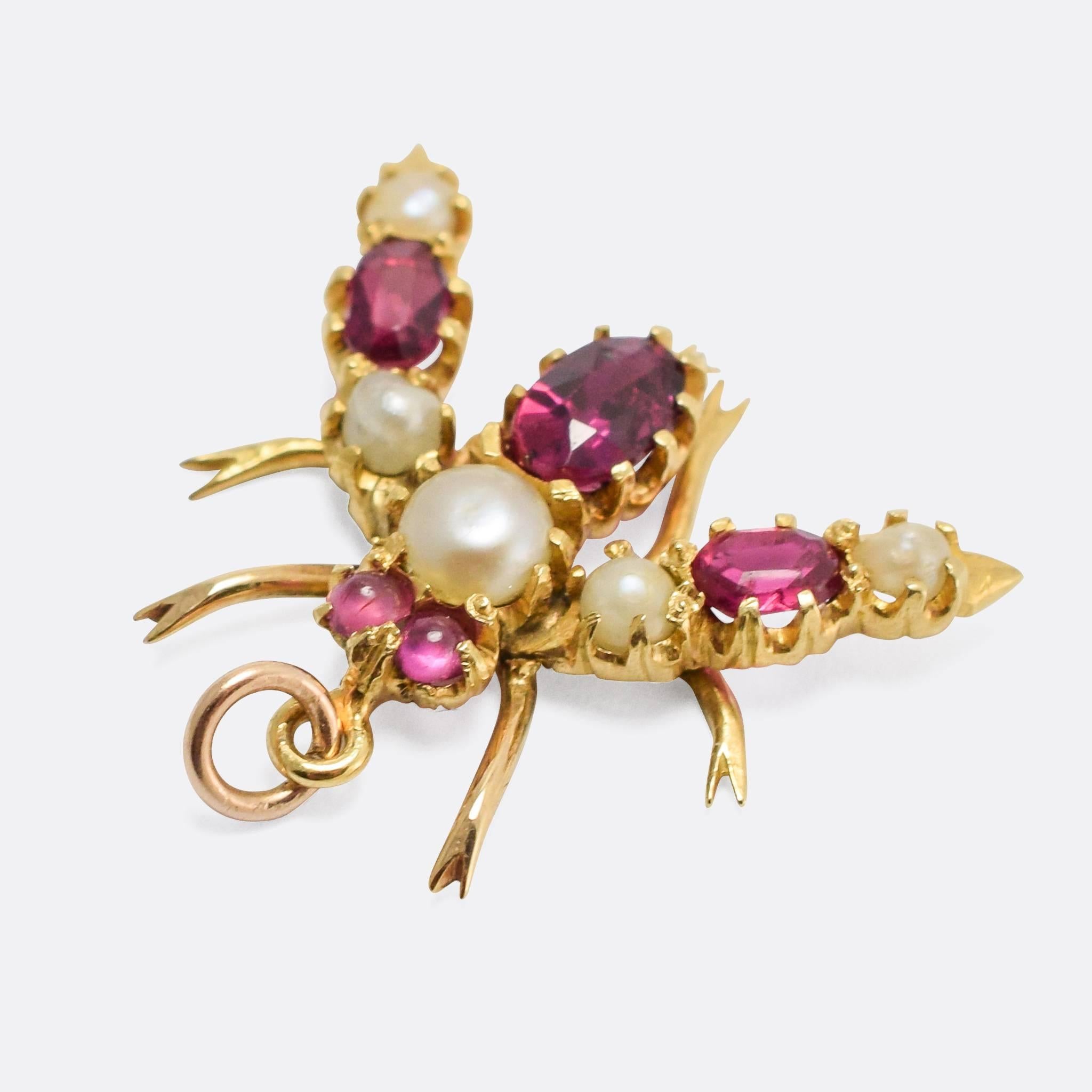 A cool late Victorian fly pendant, modelled in 9k gold and set with rubies and pearls. 

STONES
Natural Pearls and Rubies

MEASUREMENTS
1.7 x 1.9cm

WEIGHT
1.6g

MARKS
No marks present, tests as 9k gold