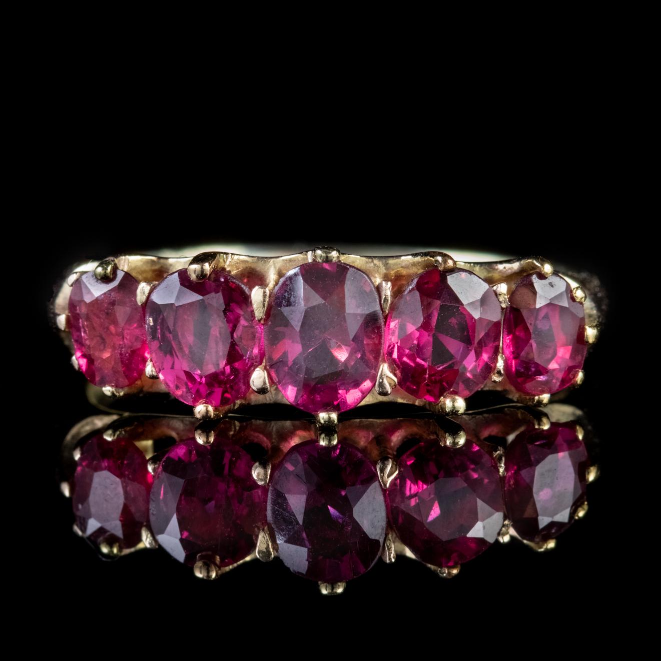 A stunning antique Victorian ring claw set with five of the most beautiful natural Rubies which graduate in size and total to an impressive 2.90ct. 

The Ruby was a favourite among kings and emperors across the globe and a worthy rival of the