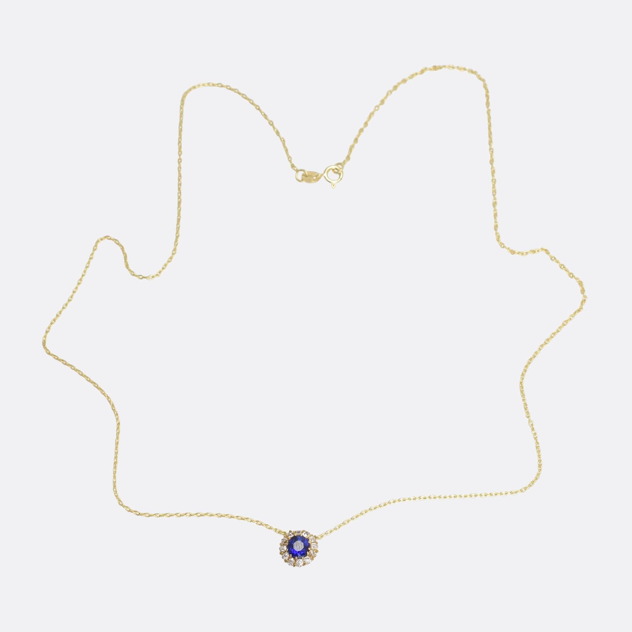 A beautiful antique sapphire and diamond cluster pendant, converted from a stick pin. The stones are mounted in elegant claw settings, and the piece measures 8.5mm in diameter. We've added a fine 9k gold chain.

STONES
Natural Blue Sapphire
Old
