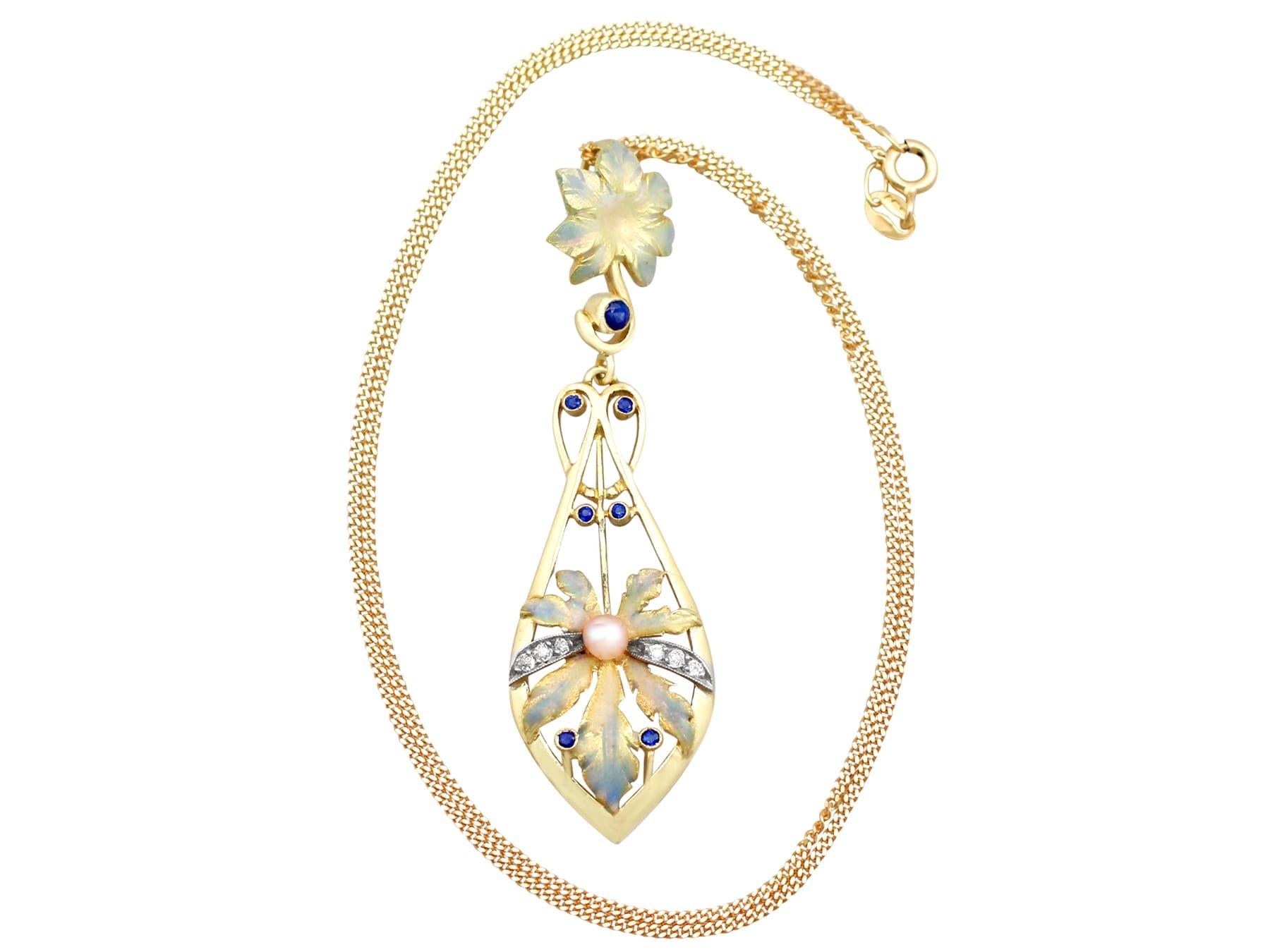 A stunning antique Victorian 0.19 carat sapphire and 0.11 carat diamond, pearl and enamel, 18 karat yellow gold necklace; part of our diverse antique jewelry and estate jewelry collections.

This stunning, fine and impressive Victorian diamond and
