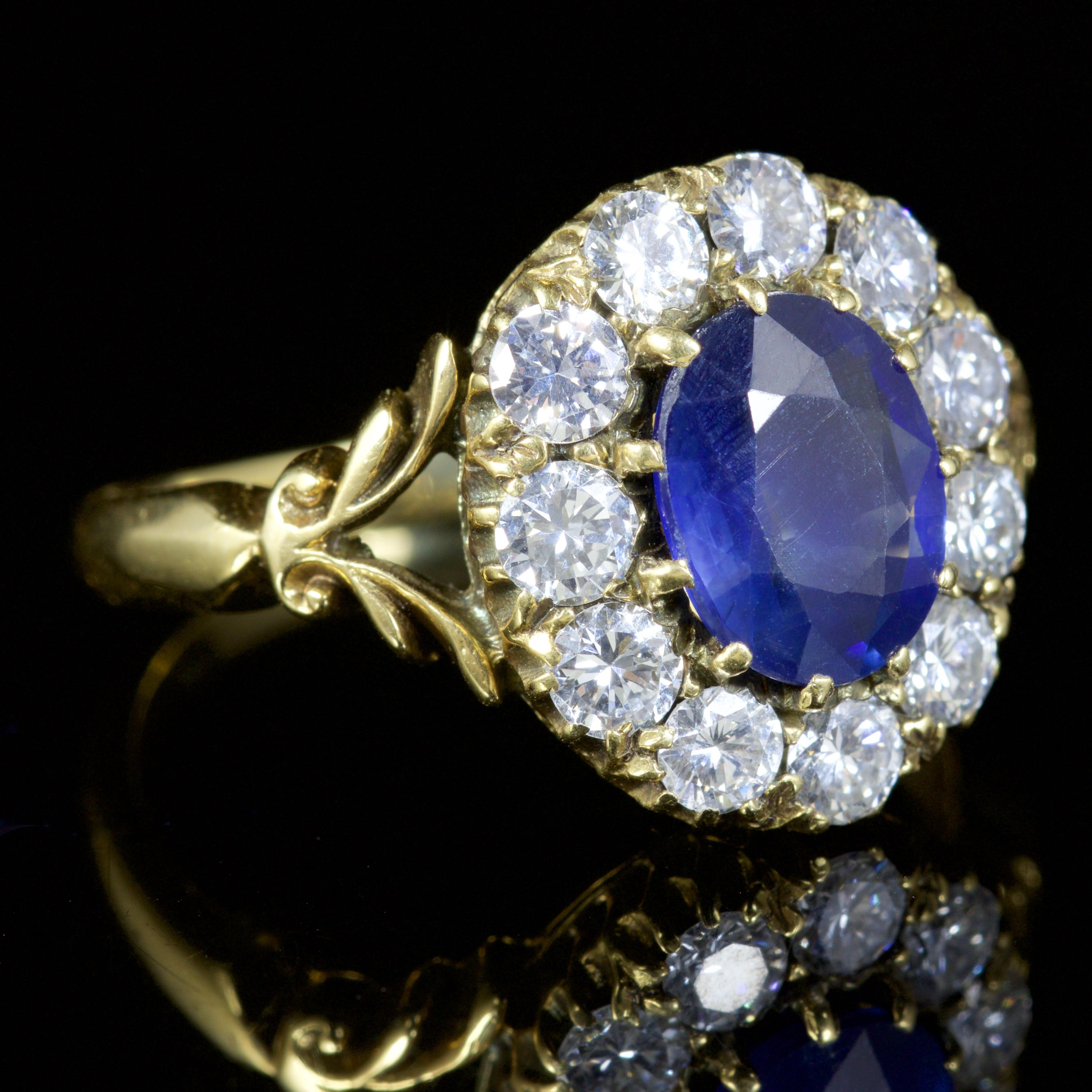 This spectacular antique Victorian 18ct Gold Sapphire and Diamond ring is, Circa 1900.

The deep blue Sapphire is approx. 1.80ct which is surrounded by a halo of beautiful Diamonds, that total to 1ct.

Sapphire is the symbol of sympathy, harmony,