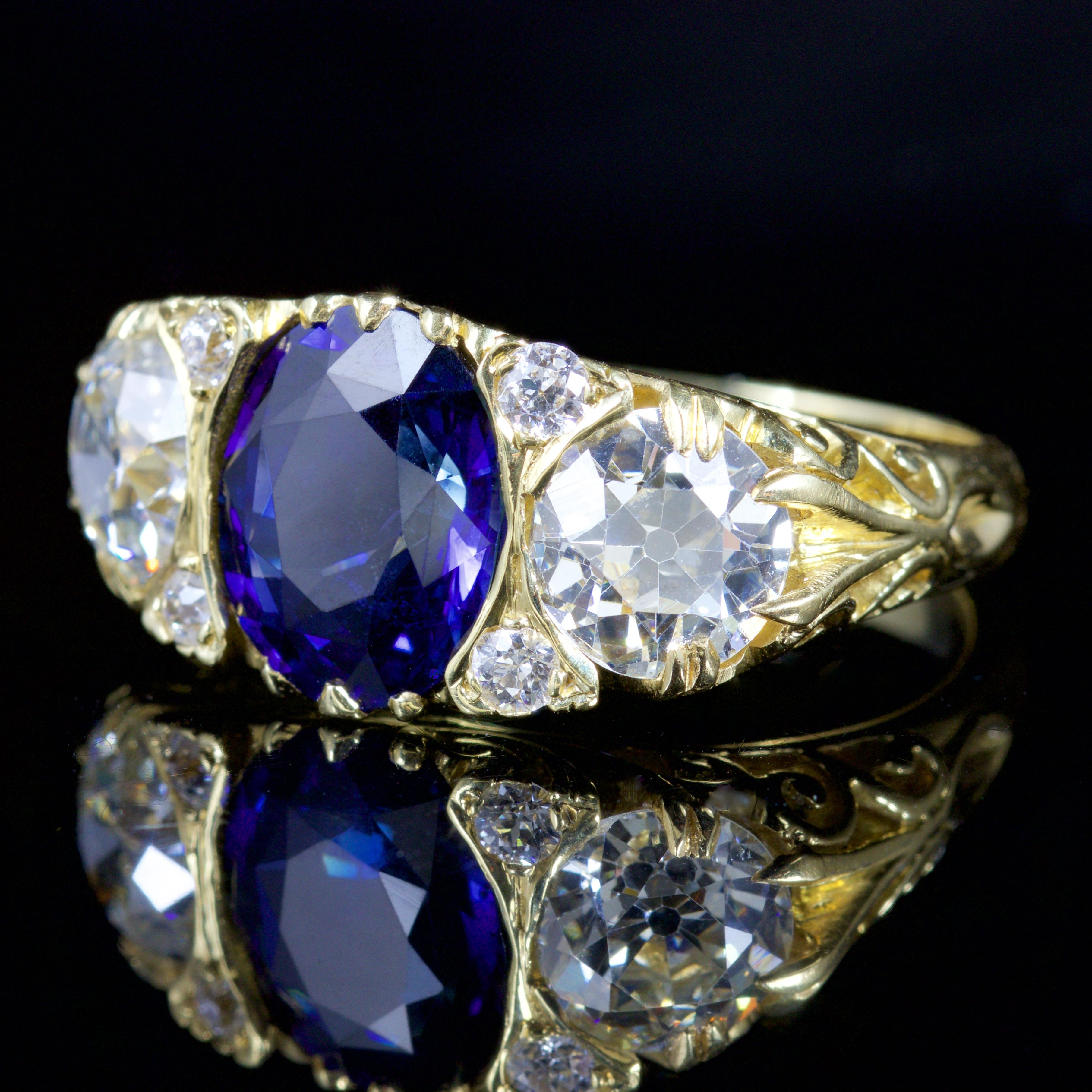 This grand and beautiful 18ct Gold Victorian ring is Circa 1880.

This spectacular ring boasts a central Sapphire which is weighted at 3.92ct, and spreads to 4ct.

Sapphire and known to bring peace and harmony to the wearer and also financial