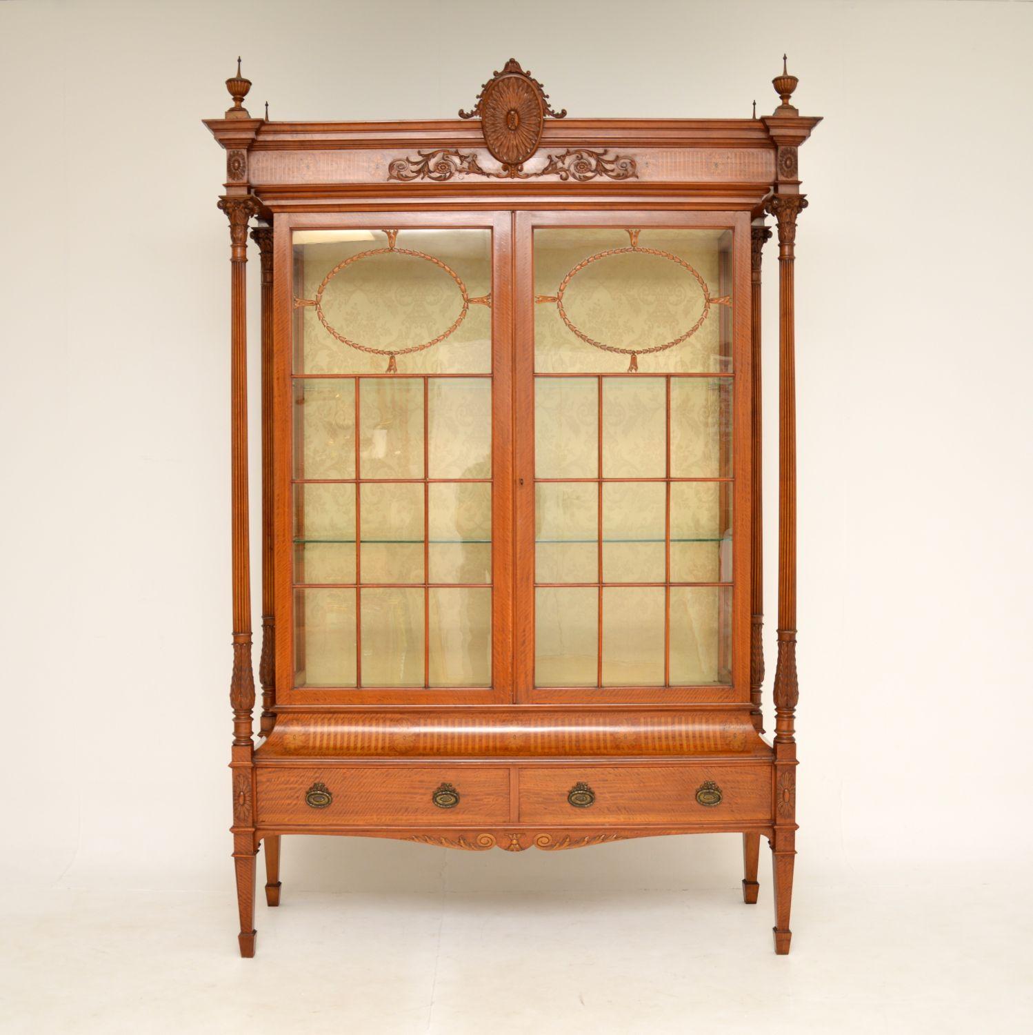 A magnificent and very rare antique Victorian satinwood display cabinet, beautifully made from inlaid satinwood. This was made in England, it dates from around the 1880-1890 period.

The quality is exceptional, one of the absolute best we have ever