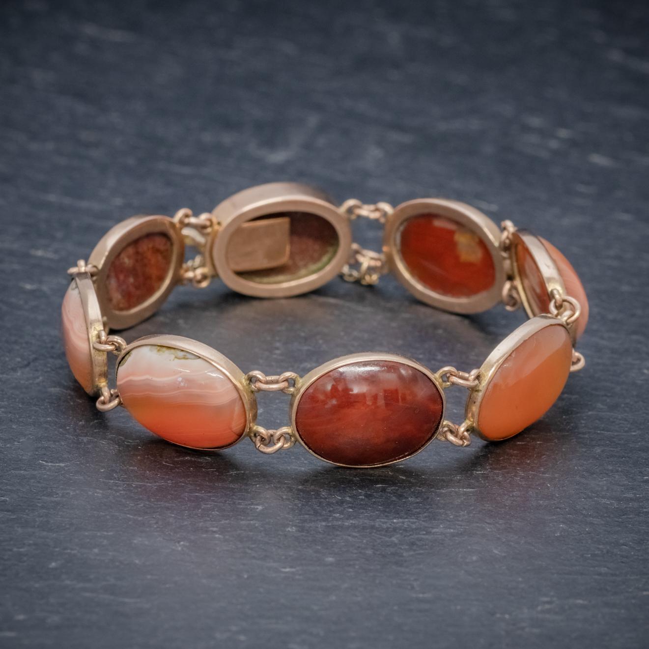 An exquisite Antique Victorian Scottish bracelet made up of beautiful banded Agates and Carnelian stones which are approx. 7ct each.

Each stone has been polished and displays unique patterning and earthy brown and amber colouring which is simply