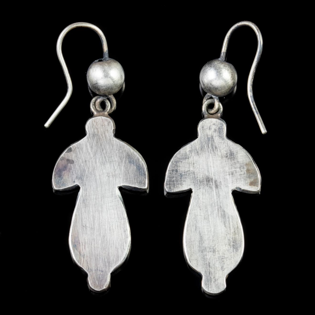 These early Victorian drop earrings are beautiful examples of the Scottish jewellery which was popular during this period. 

Scottish jewellery was endorsed by Queen Victoria as it became a souvenir of her frequent trips to Scotland and her Scottish