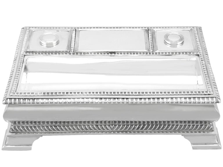 A magnificent, fine and impressive antique Victorian Scottish sterling silver inkstand made by Hamilton & Inches; an addition to our ornamental silverware collection.

This exceptional antique Victorian sterling silver desk standish has a