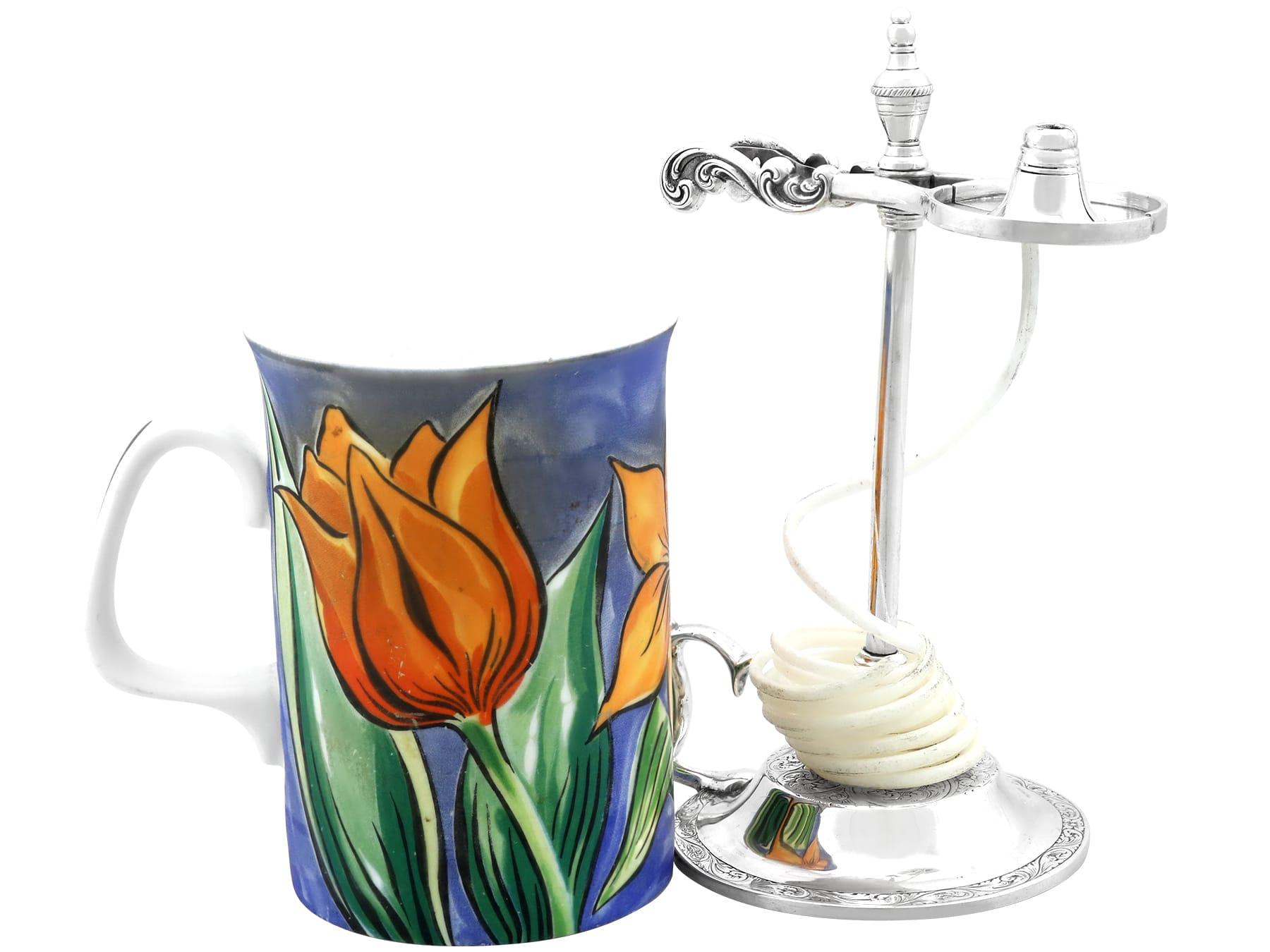 Un excepcional, fino e impresionante, inusual y antiguo gato de cera escocés victoriano de plata de ley; un complemento de nuestra colección de platería ornamental.

Este excepcional gato de cera escocés victoriano antiguo de plata de ley tiene
