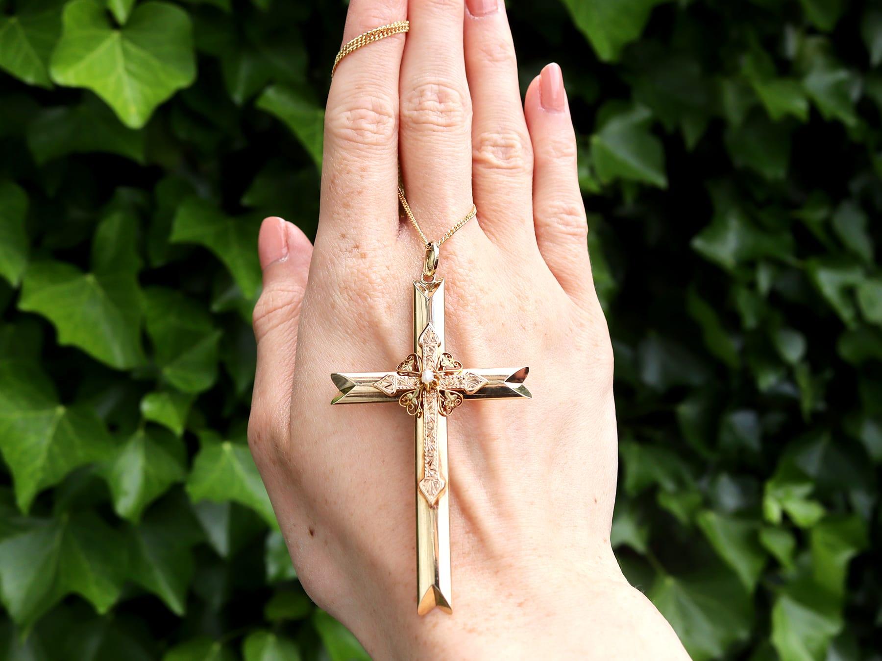 An impressive antique Victorian seed pearl and 14 karat yellow gold, 14 karat rose gold cross pendant; part of our diverse antique jewellery and estate jewelry collections.

This fine and impressive Victorian cross pendant has been crafted in 14k