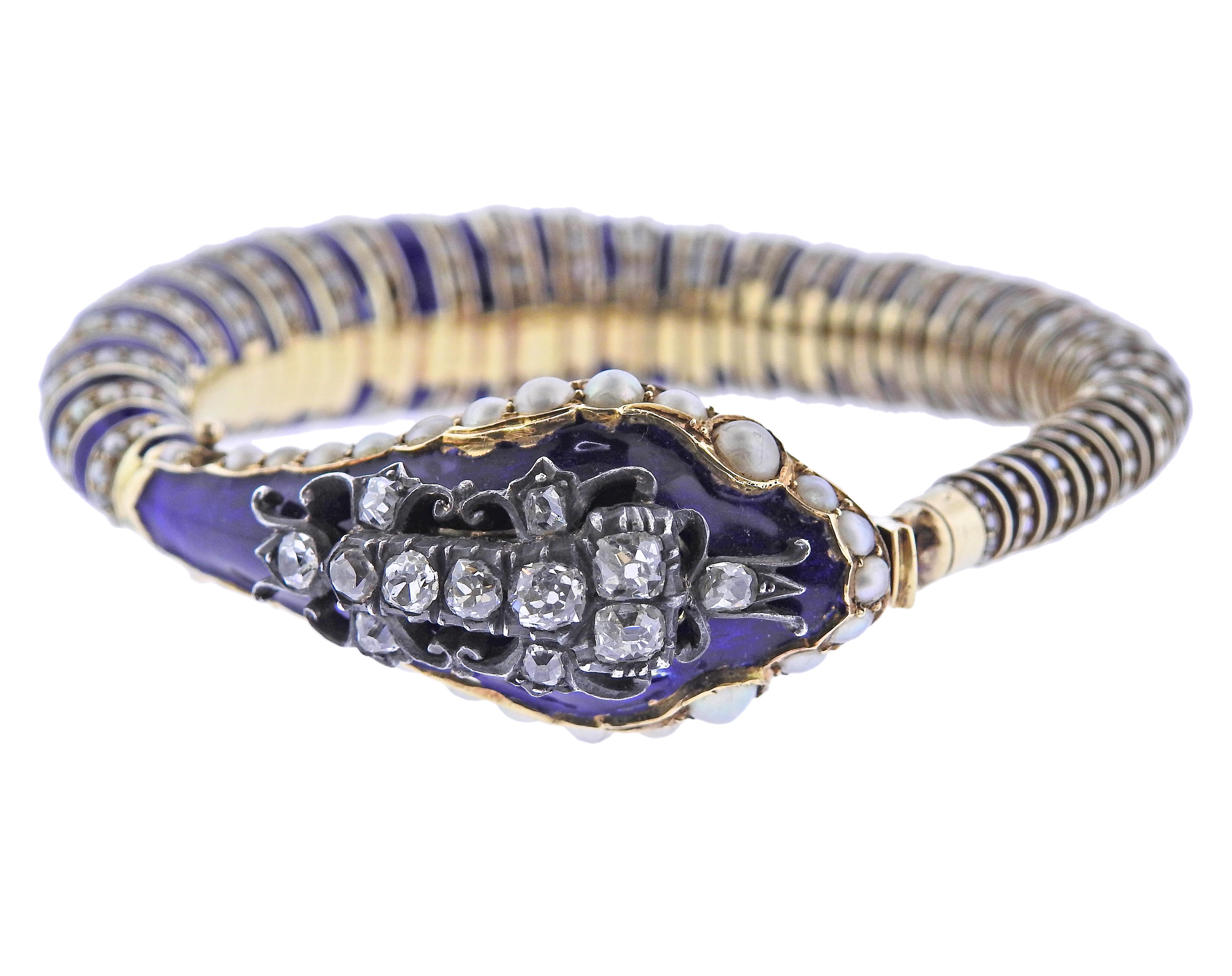 Exquisite Victorian 14k gold snake bracelet, featuring seed pearls, and old mine cut diamonds - approx. 1.20tw, with blue enamel. Bracelet is 7.25