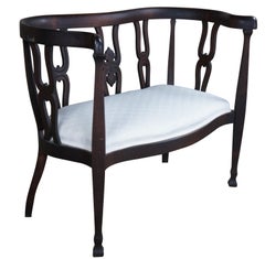 Antike viktorianische Loveseat-Bank aus geschnitztem Mahagoni mit Serpentinen-Oxbow-Schnitzerei