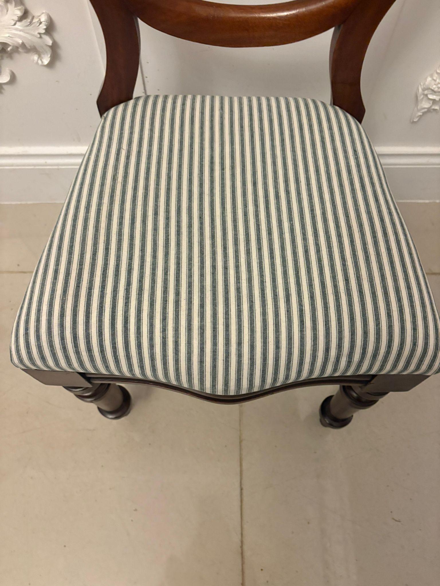  A lovely set of four antique Victorian mahogany balloon-back dining chairs with elegant lines and a warm, well-preserved patina. Each chair features a shaped balloon back with a carved top rail and generously curved supports, giving the set a