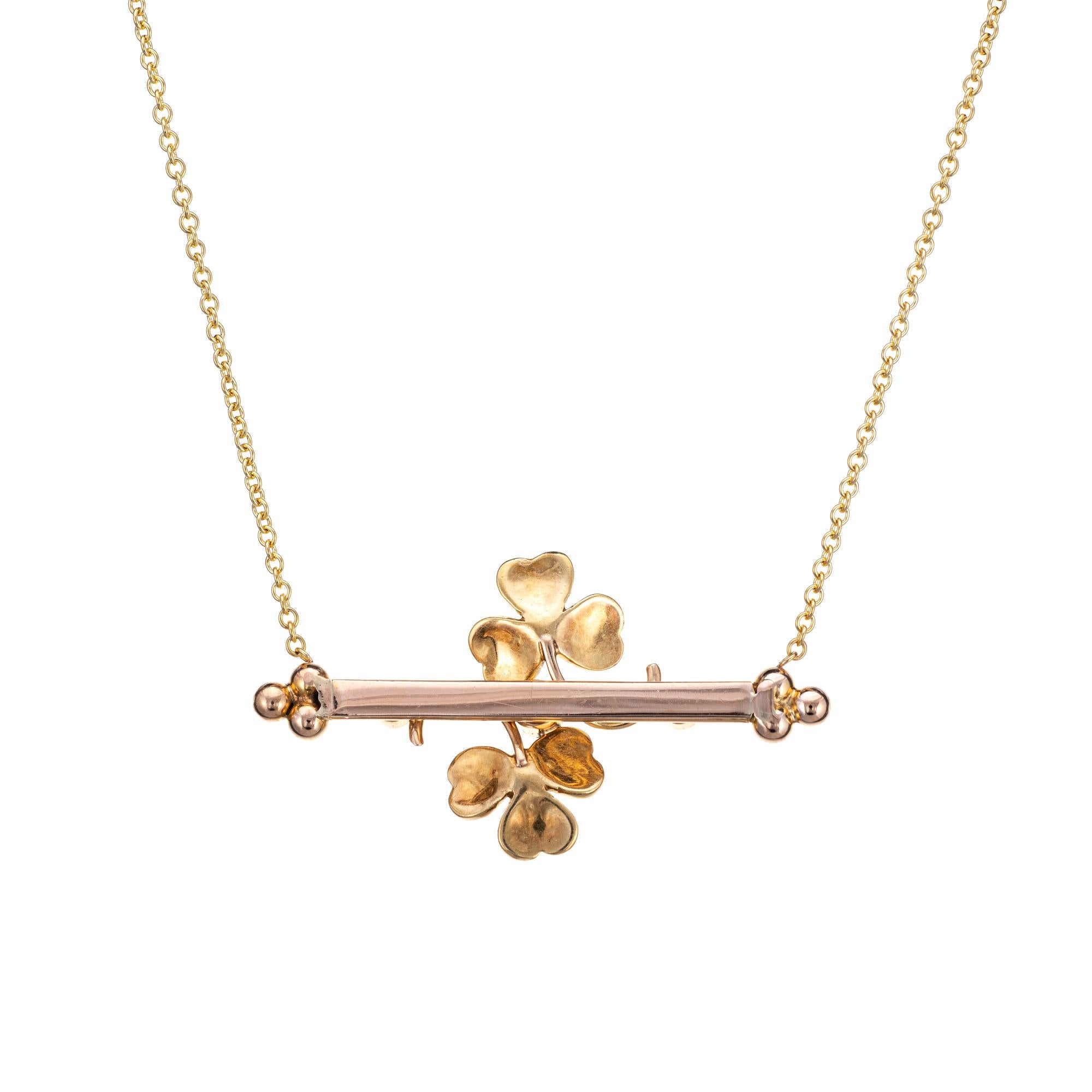 Originally an antique Victorian era brooch (circa 1880s to 1900s), the shamrock necklace is crafted in 14 karat yellow gold.

The brooch is mounted to a fine link 14k yellow gold chain. The beautifully detailed shamrock is set with seed pearls and