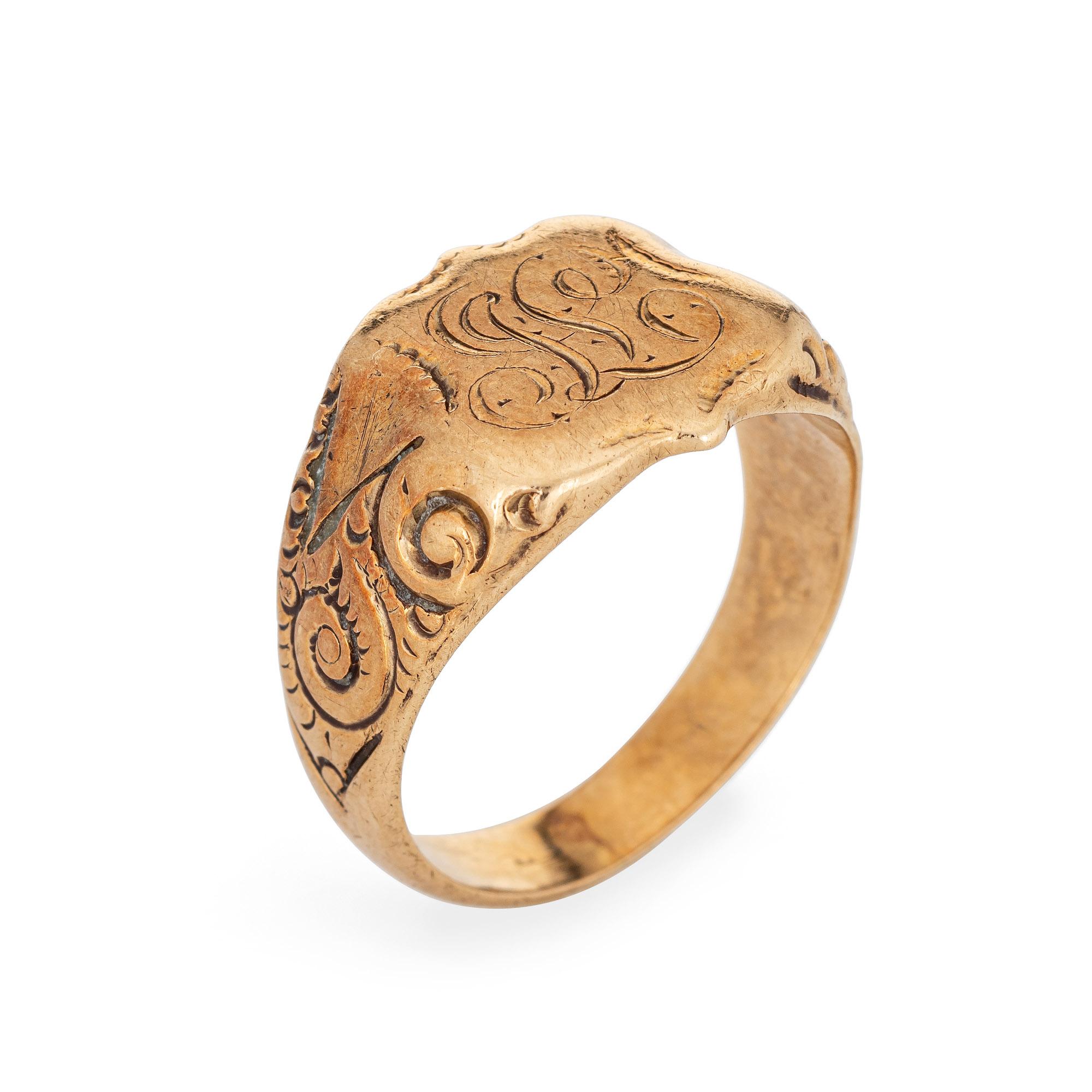 Lovely antique Victorian shield signet ring (circa 1880s to 1900s), crafted in 14 karat rose gold. 

From what we can decipher, the center shield is engraved with the initials 