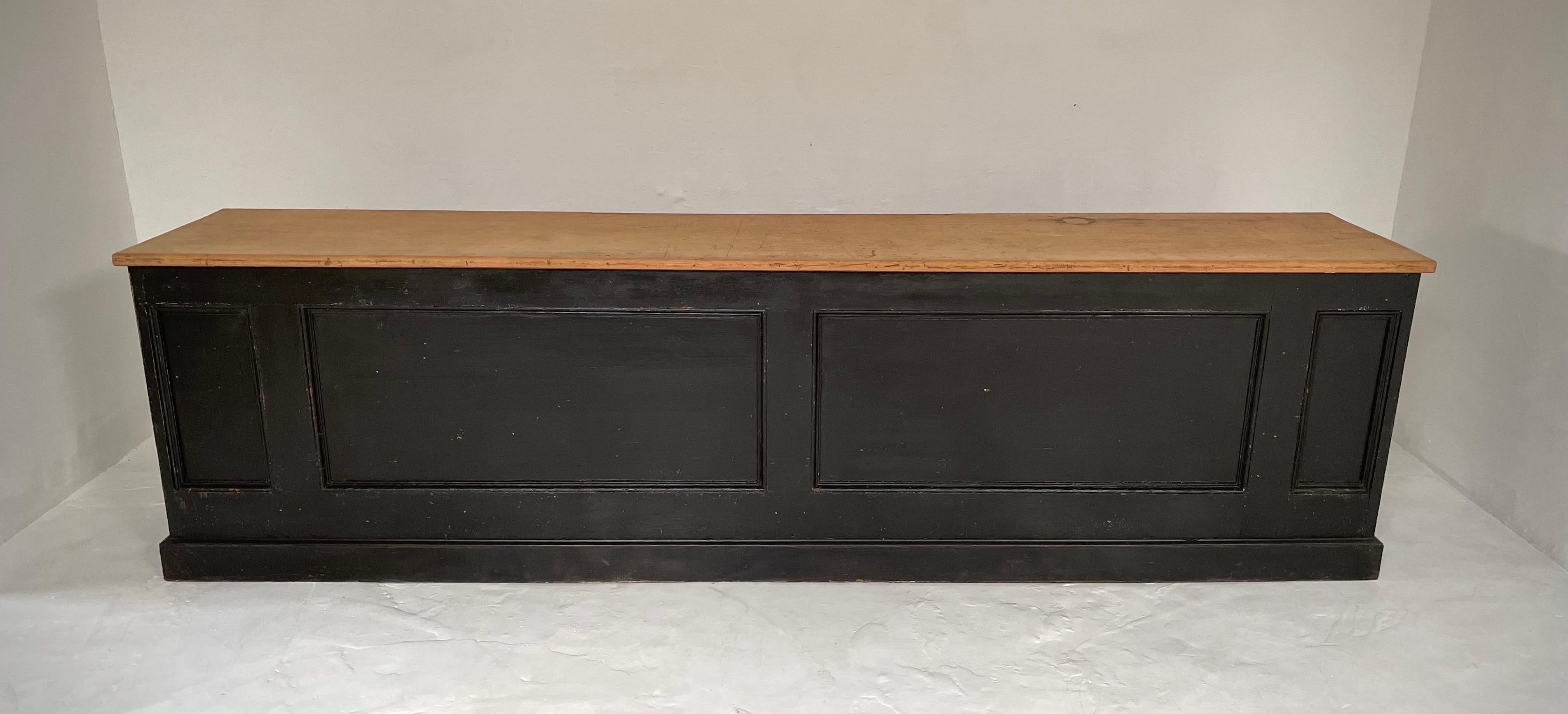 Incredible Victorian shop counter which originates from a haberdashery shop in the Spitalfields area of London, an area renowned for Jewish tailors . The front has two large and two smaller decorative panels; we believe it may have been cut down at