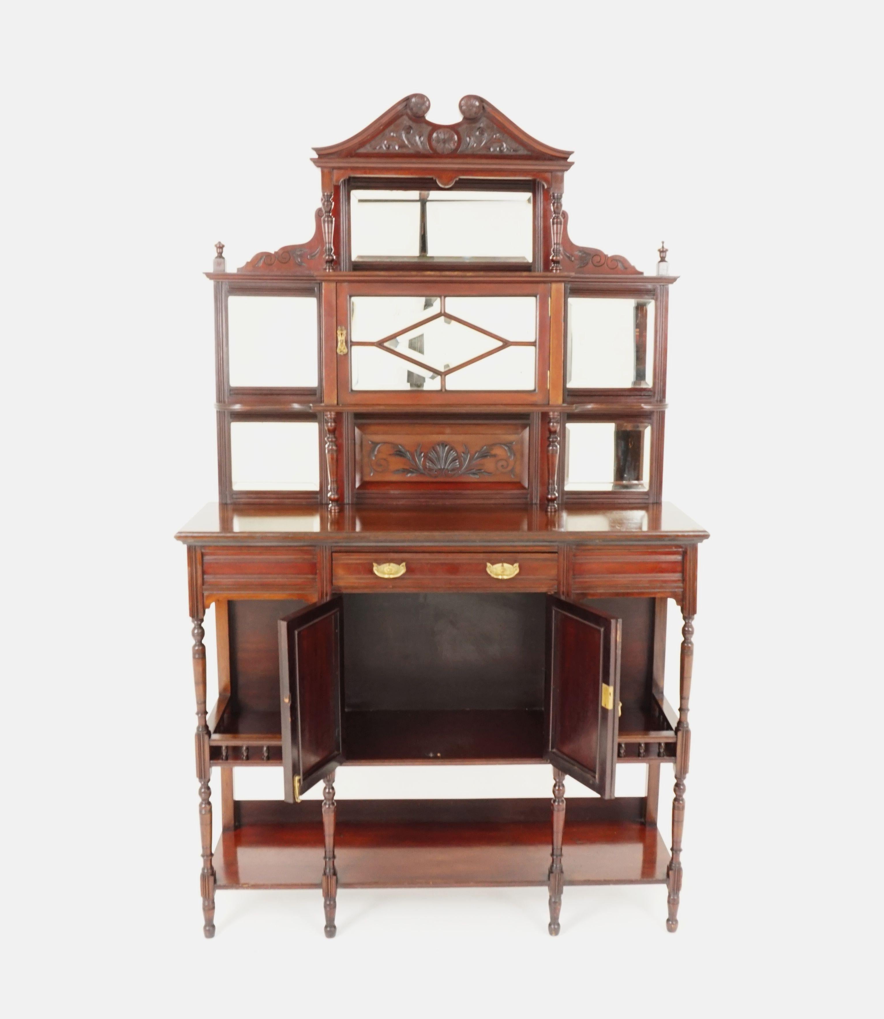 Antique Victorian Side Cabinet, Walnut Display Cabinet, Scotland 1880, H198

Scotland 1880
Solid Walnut
Original Finish
Carved Swan Neck Pediment 
Rectangular Beveled Mirror Below
Five Beveled Mirrored Door Opens To Reveal Storage Compartment