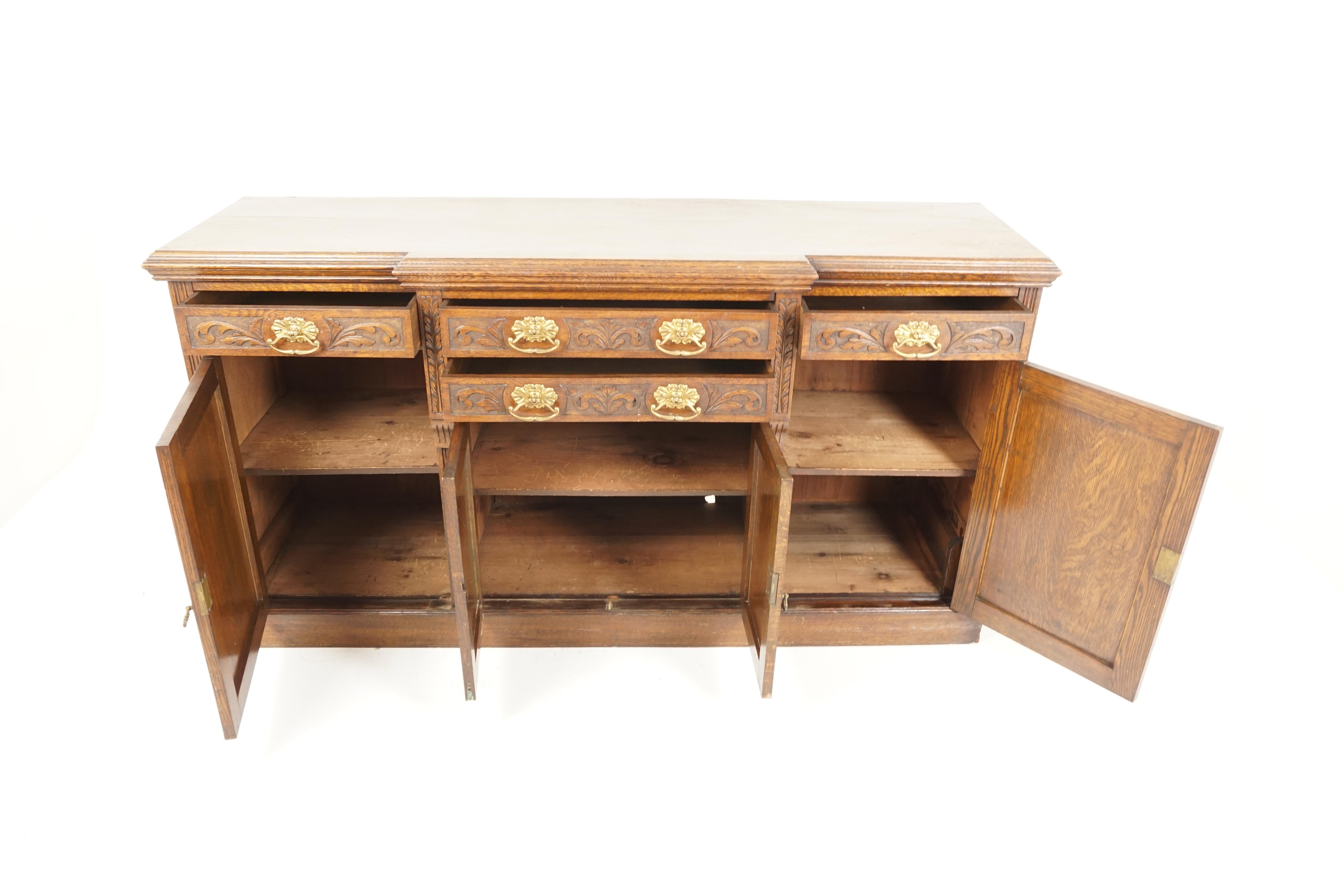 Antique Victorian sideboard, carved oak, buffet/chiffonier, Scotland 1900, B2696

Scotland 1900
solid oak
original finish
moulded rectangular top
heavily carved front with a pair of carved drawers in the middle
flanked by a pair of