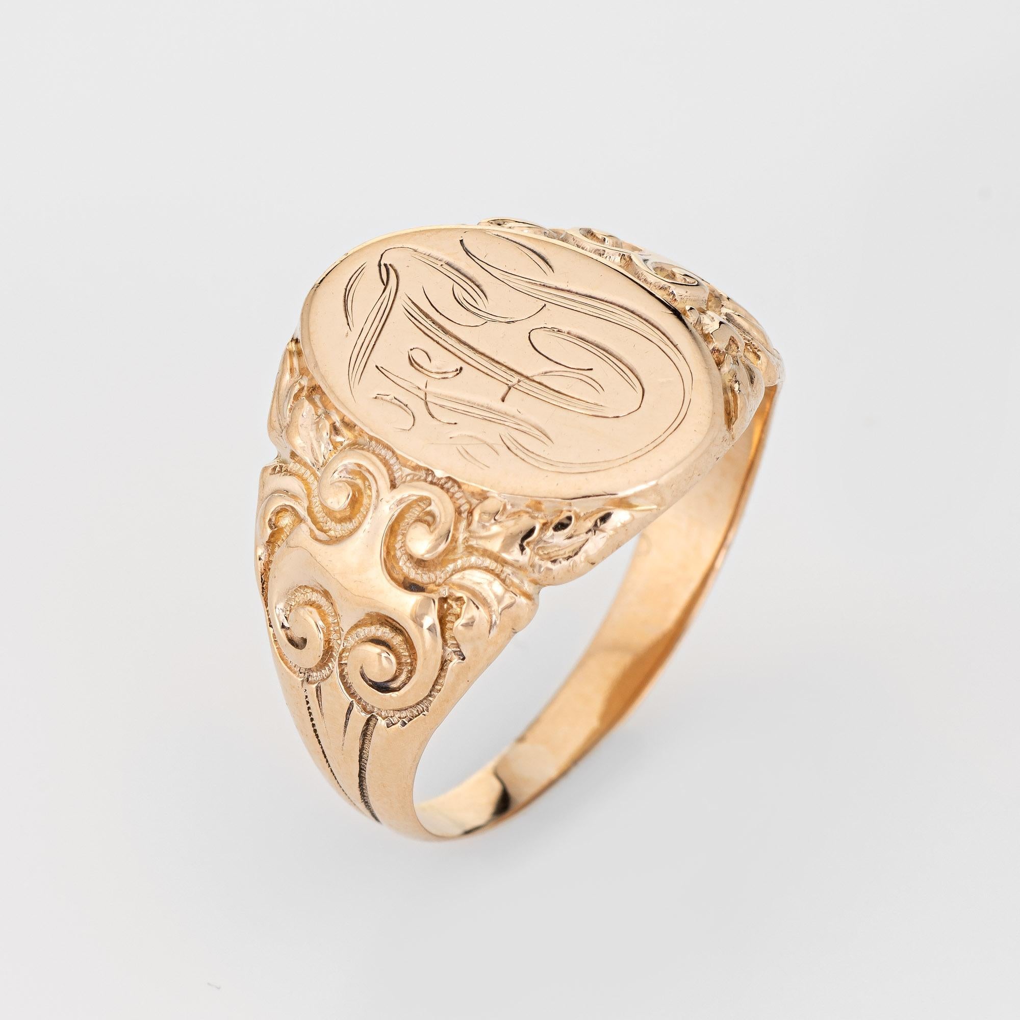 Finely detailed antique Victorian oval signet ring (circa 1880s to 1900s), crafted in 10 karat yellow gold. 

The center oval is engraved in old script with the initials (from what we can decipher) 