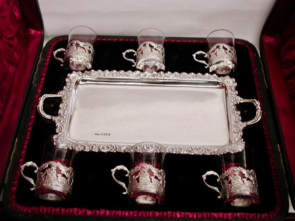 Antique Victorian Silver and Glass Liqueur Set On Tray In Fitted Box,1894
Fabulous Set in original leather box with satin and velvet linings.
The liqueur glasses are beautifully embossed and pierced by Henry Atkins and made in Sheffield.