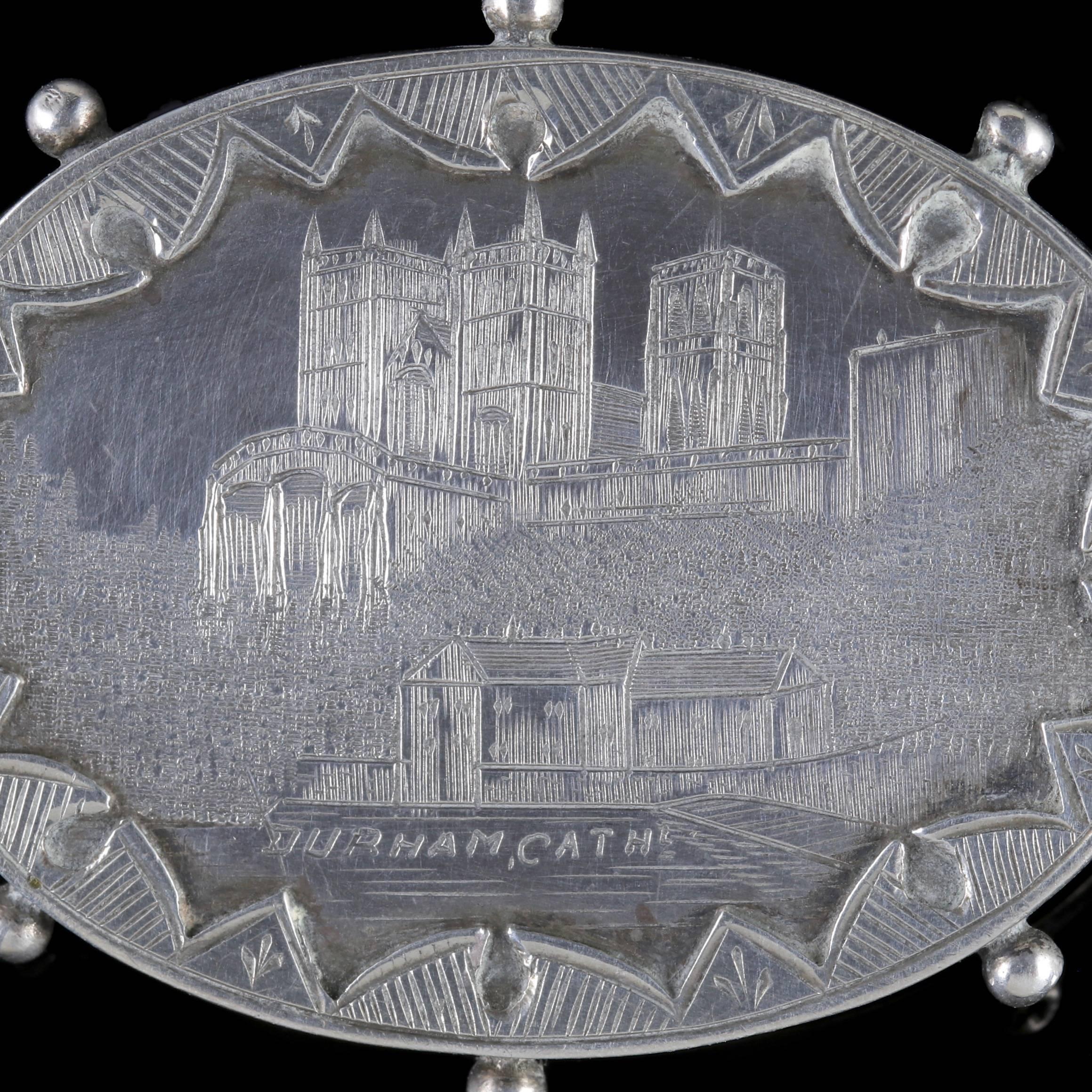 This wonderful antique Victorian Sterling Silver brooch is dated Birmingham 1893.

The brooch depicts a beautiful engraved image of Durham Cathedral with intricate detailing applied. 

All set in Sterling Silver and fitted with a secure pin and