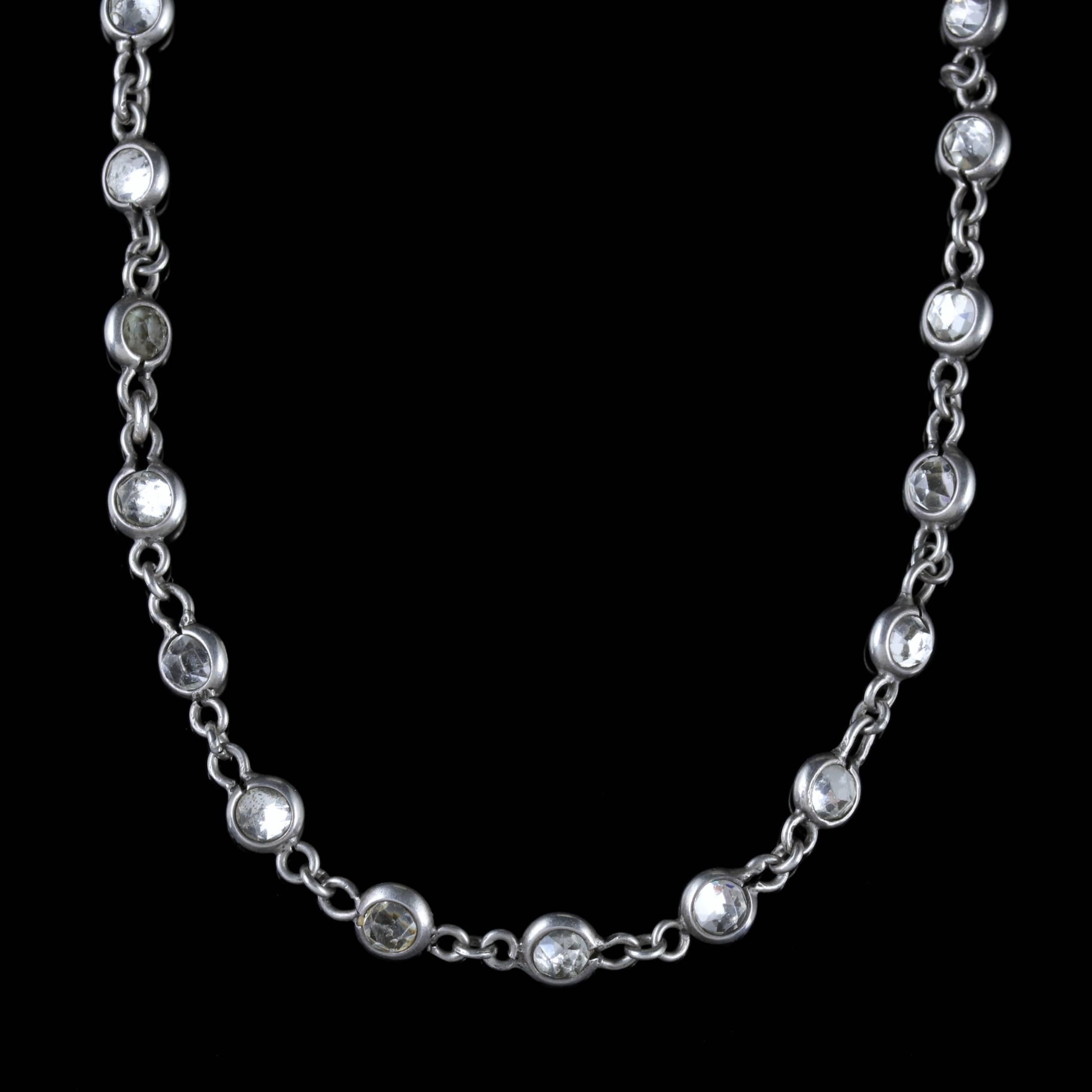 To read more please click continue reading below-

This stunning long antique Silver chain is a genuine Victorian piece, Circa 1900. 

The fabulous long necklace is adorned with sparkling Crystal balls set into Silver links. 

The necklace displays