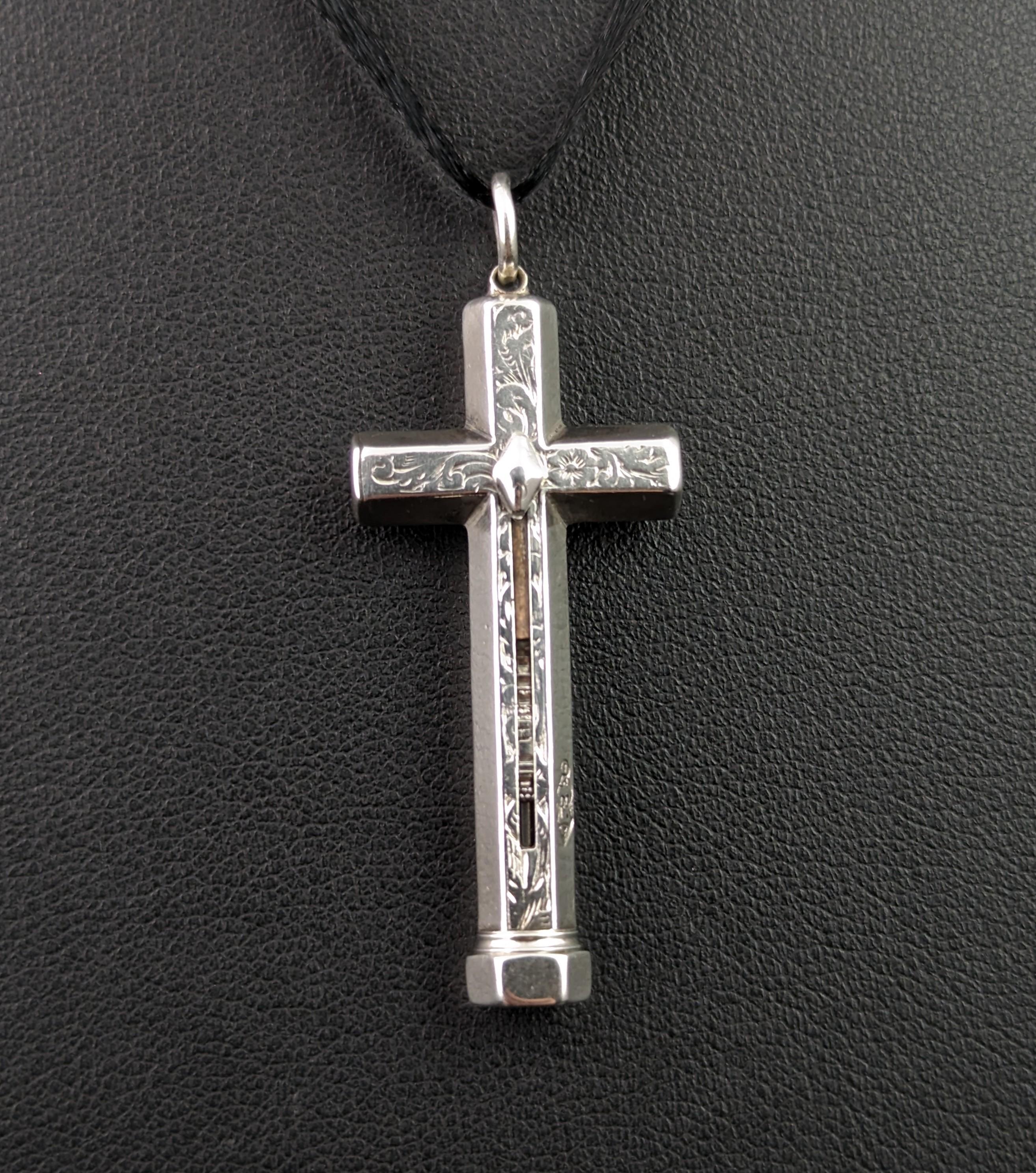 This spectacular antique Silver cross pendant hides a special feature, it is not only a gorgeous antique pendant but also a Propelling pencil.

An unusual design, very well made by a renowned manufacturers of the era Sampson and Mordan.

It has has