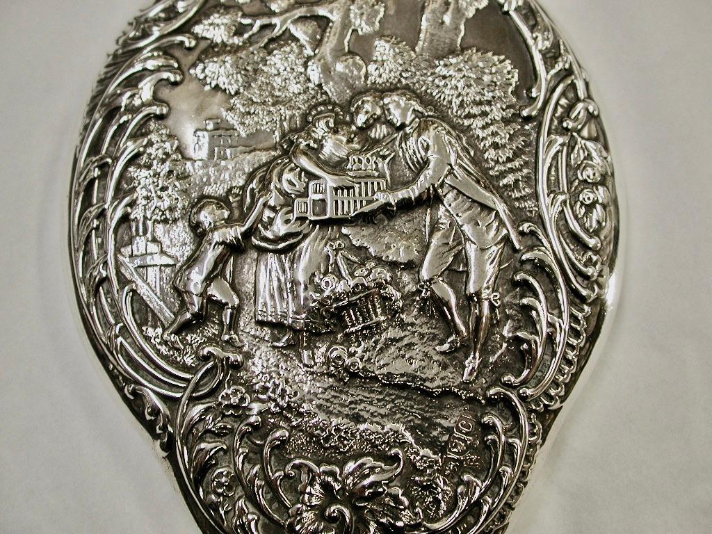 British Antique Victorian Silver Embossed Hand Mirror Dated 1898 London William Comyns For Sale