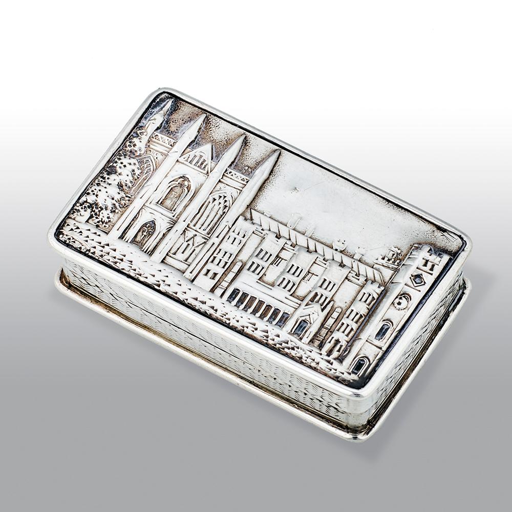 An exceptional, fine antique Victorian silver castle top vinaigrette depicting Newstead Abbey in high relief, of shaped rectangular form with engine turned sides and base. The silver gilt interior with finely pierced scroll grille. 

Newstead