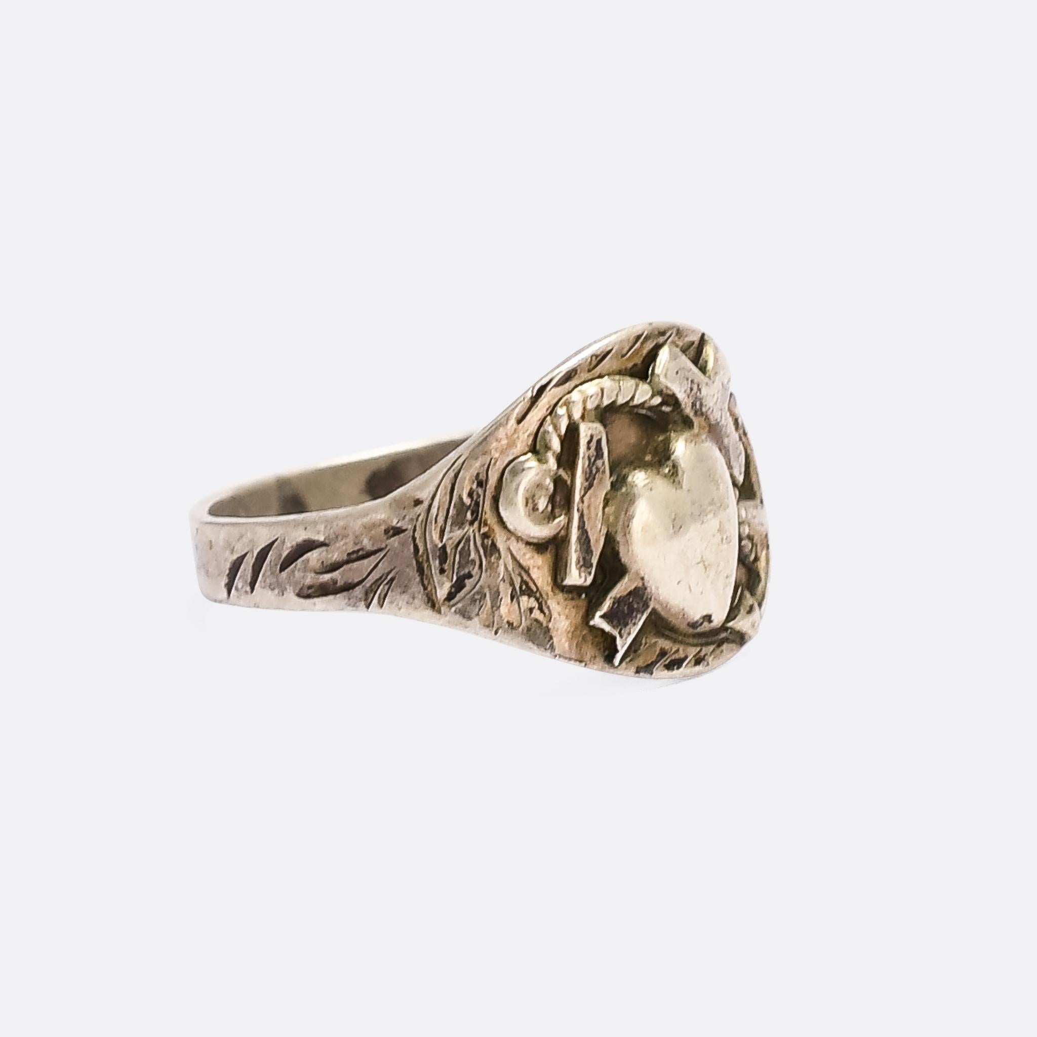 An unusual, and quite charming, antique signet ring with the classic 