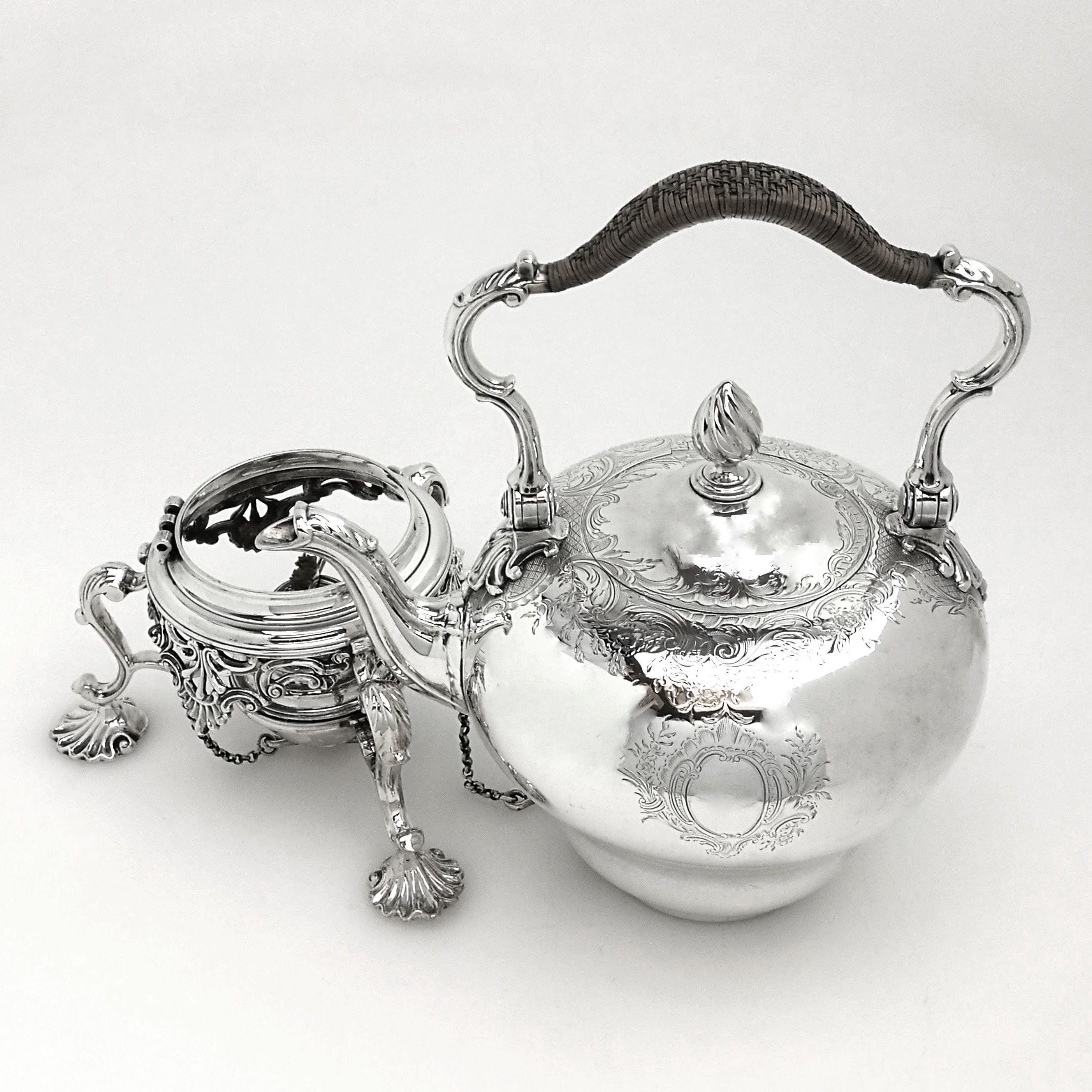 silver teapot with burner