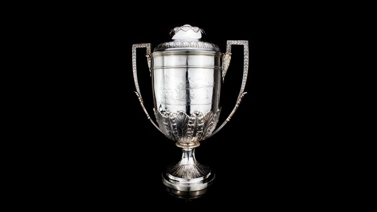Antique Victorian silver large trophy cup.
Made in England, London, 1886
Maker: Elkington & Co (Frederick Elkington)

Fully hallmarked.

Approx dimensions:
35 x 23 x 41 cm 
Total weight: 3,150 grams

Condition: Minor wear from general
