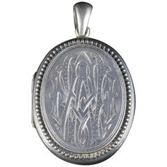 Antique Victorian Silver Locket Engraved, circa 1900 Antique Victorian Silver Locket Engraved, circa 1900