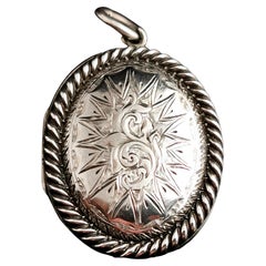 Antique Victorian silver locket pendant, engraved 