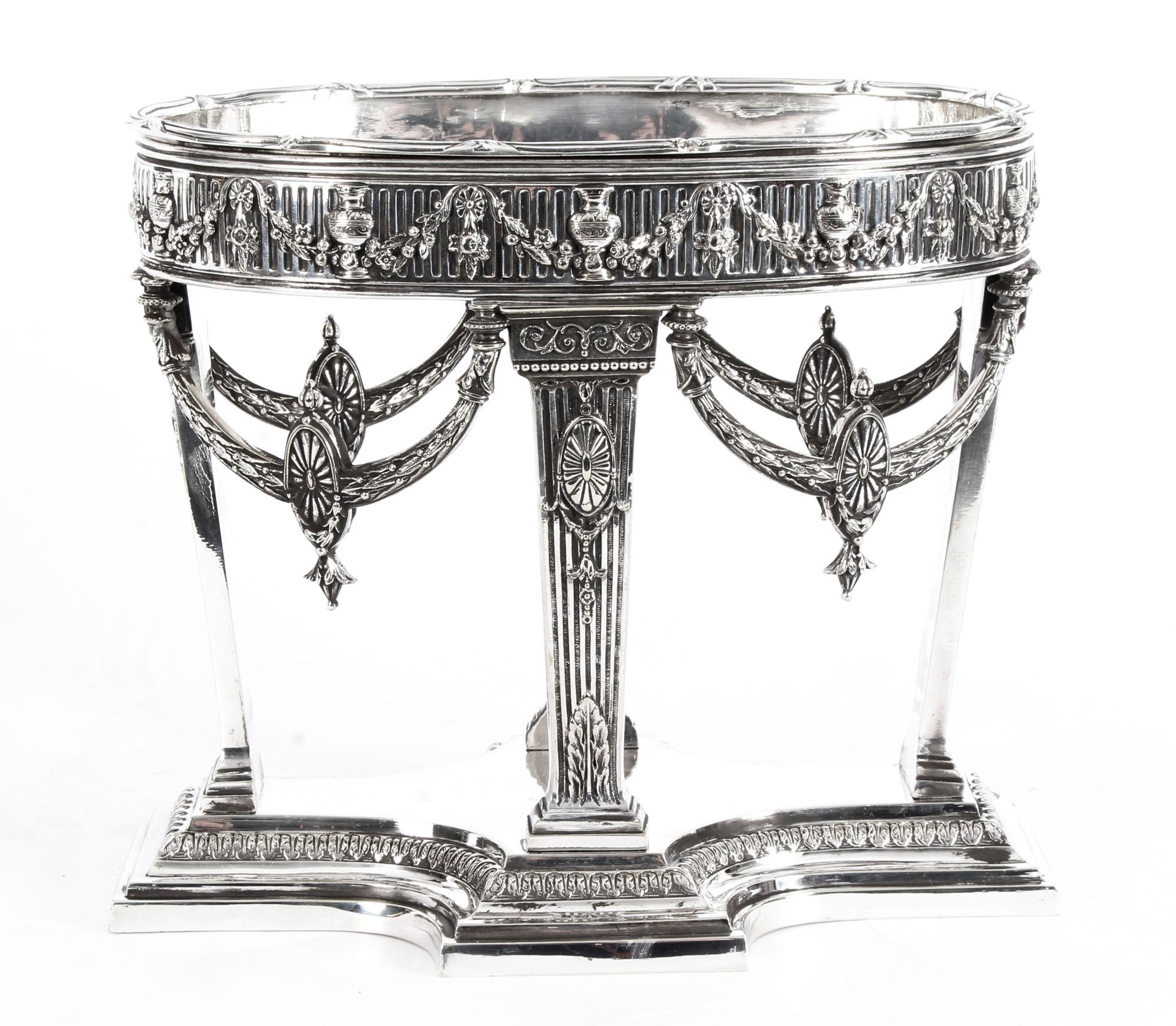 This is an intricate, extremely attractive and exquisitely made antique Victorian silver plated centrepiece by the renowned silversmith, Horace Woodward and Co., Birmingham, 1876 in date.
 
This stunning centrepiece has a central oval silver