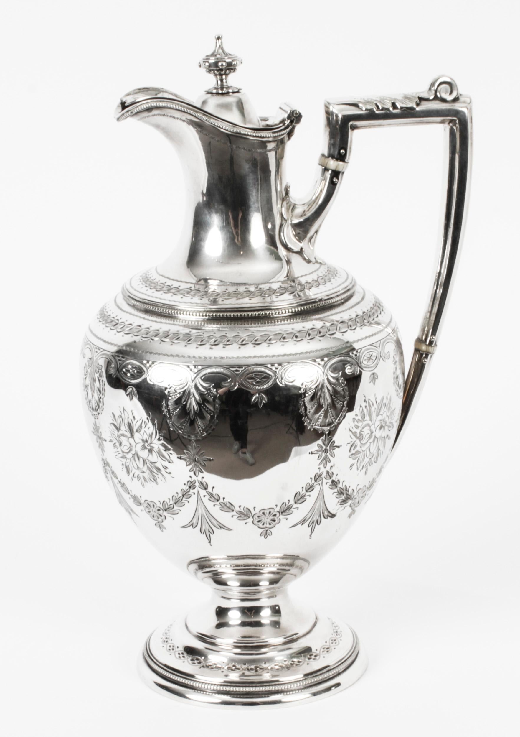 This is a truly stunning English Victorian silver-plated claret jug, bearing the makers' mark of the renowned silversmiths, Frank Cobb & Co Ltd, circa 1880 in date.
 
This magnificent claret jug has a charming rounded shape, stands on an elegant