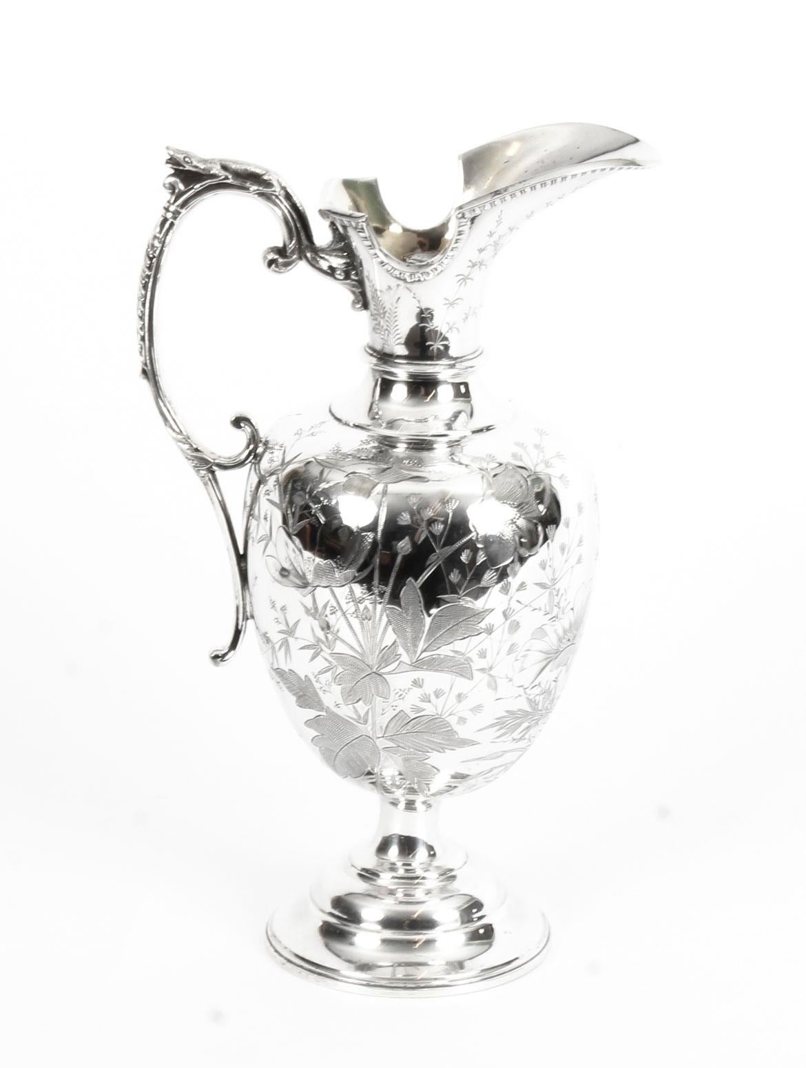 This is a truly stunning English Victorian silver-plated claret jug, bearing the makers' mark of the renowned silversmiths Atkin Brothers, Sheffield, circa 1880 in date.
 
This magnificent claret jug has a charming rounded shape, stands on an