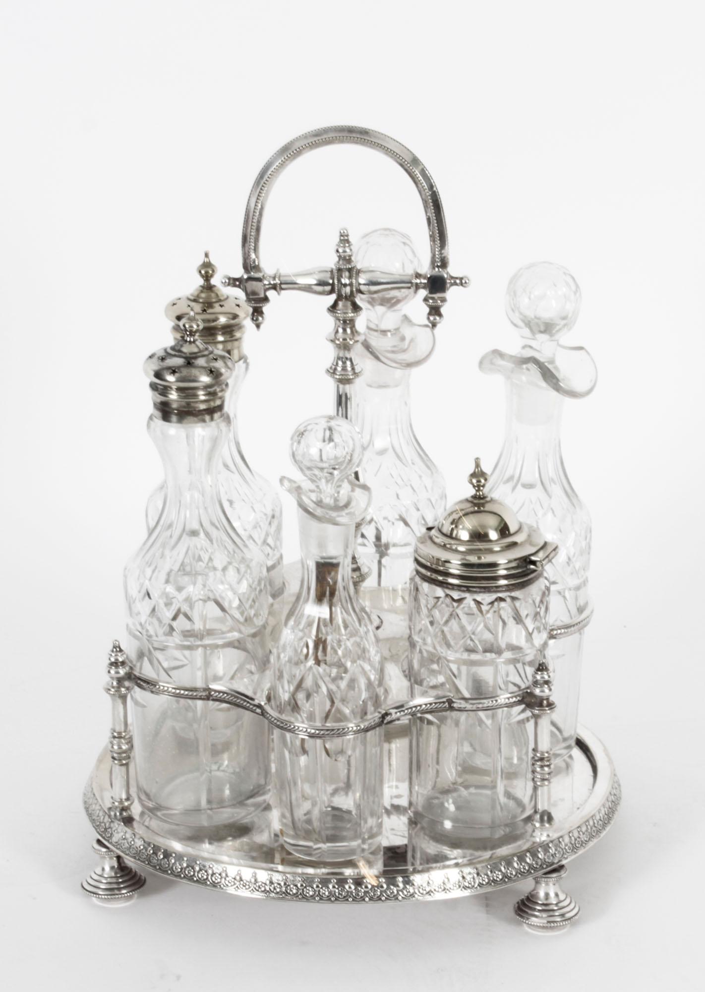 This is a gorgeous antique silver plated cruet set bearing, circa 1880 in date.
 
The set comprises a beautifully decorative silver plated cruet stand holding six exquisite cut glass condiment bottles traditionally for chilli, soy, cayenne,
