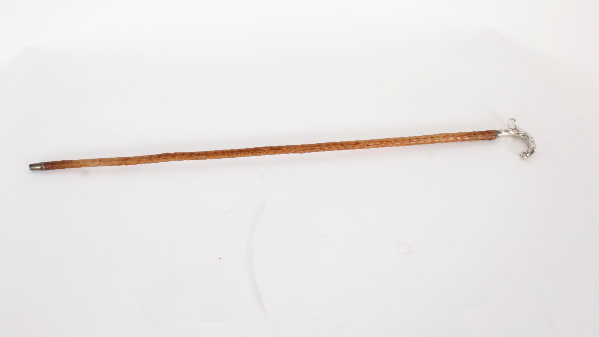 This is a beautiful antique Victorian silver plated child's walking stick, circa 1890 in date

The striking stick features an ornate silver crutch handle having a profusely embossed floral design, on a gentle tapering hardwood shaft which has its