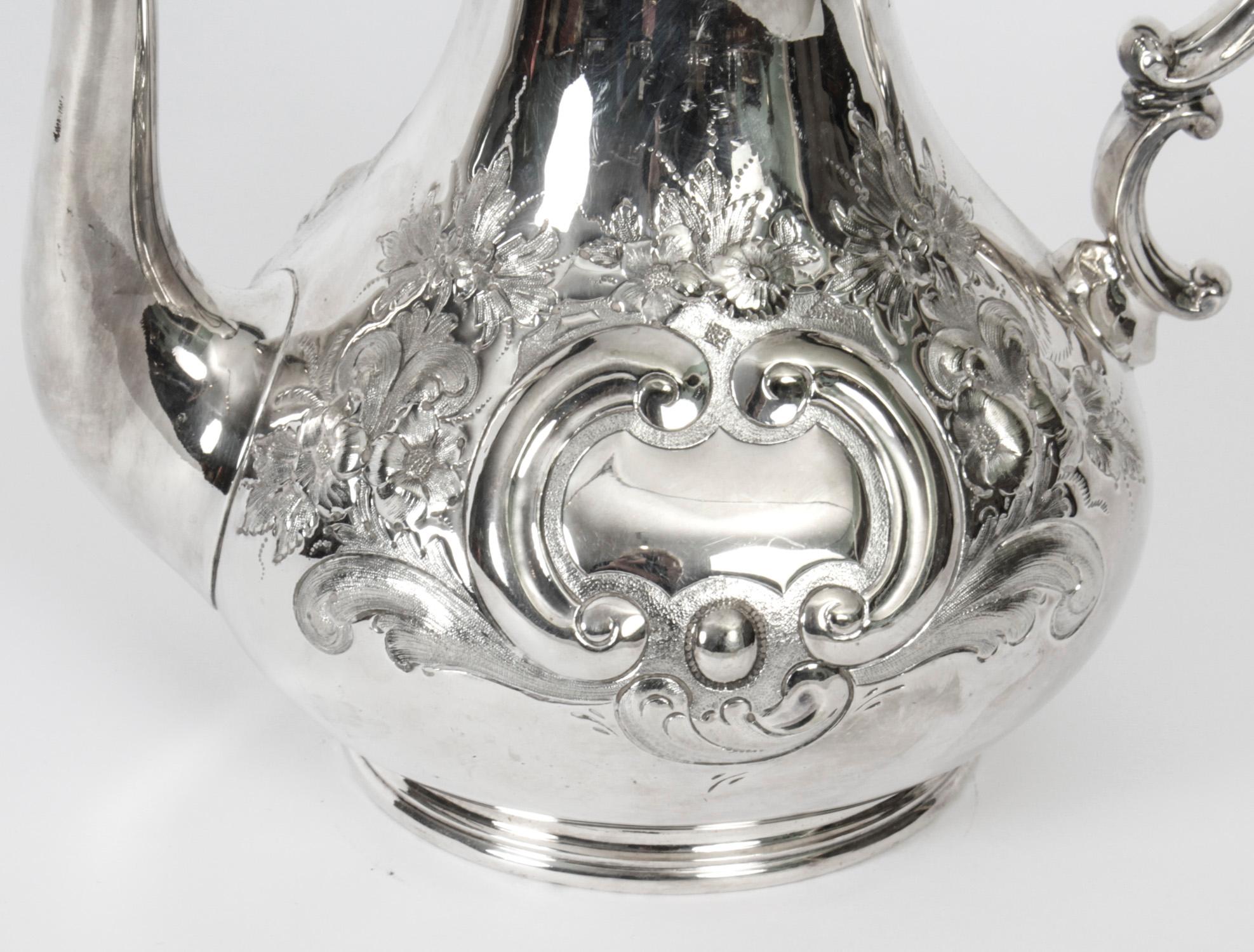 This is a lovely antique Victorian silver plated coffee pot by Boardman Glossop & Co, Sheffield dating from Circa 1870.

The coffee pot features a baluster form which is decorated with chased and engraved foliate and floral ornamentation, with an