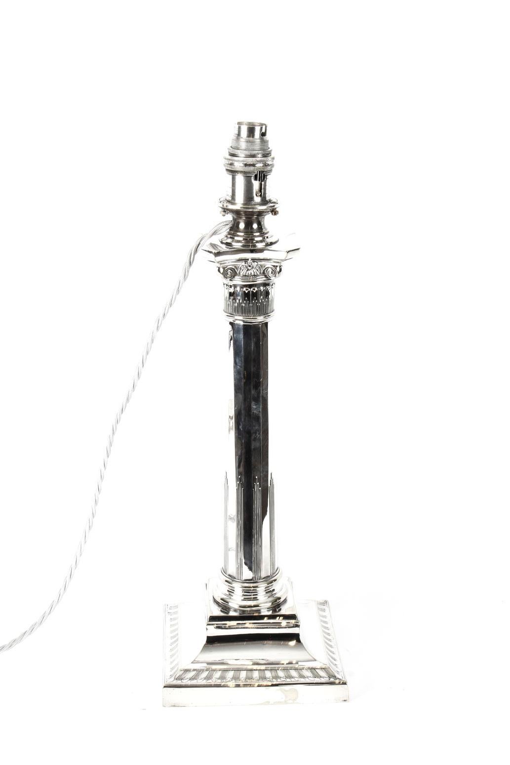 This is an impressive antique Victorian silver plated Corinthian column table lamp bearing the makers mark of the renowned silversmith Hawksworth, Eyre & Co, late 19th century in date.
 
It features a classic Corinthian capital decorated with
