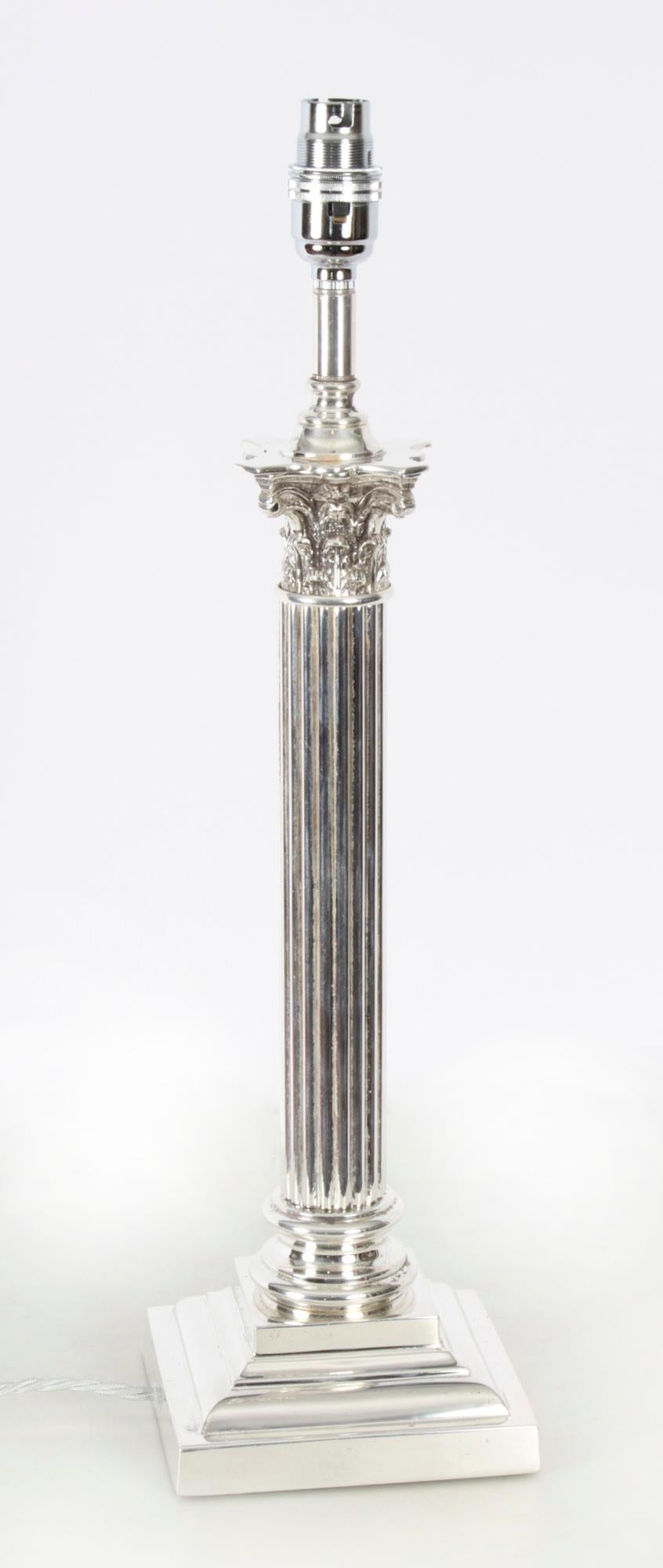 This is a splendid antique Victorian silver-plated Corinthian column table lamp now converted to electricity, late 19th century in date.
 
This opulent antique table lamp features a kingly Corinthian Capital decorated with classical ornate foliage