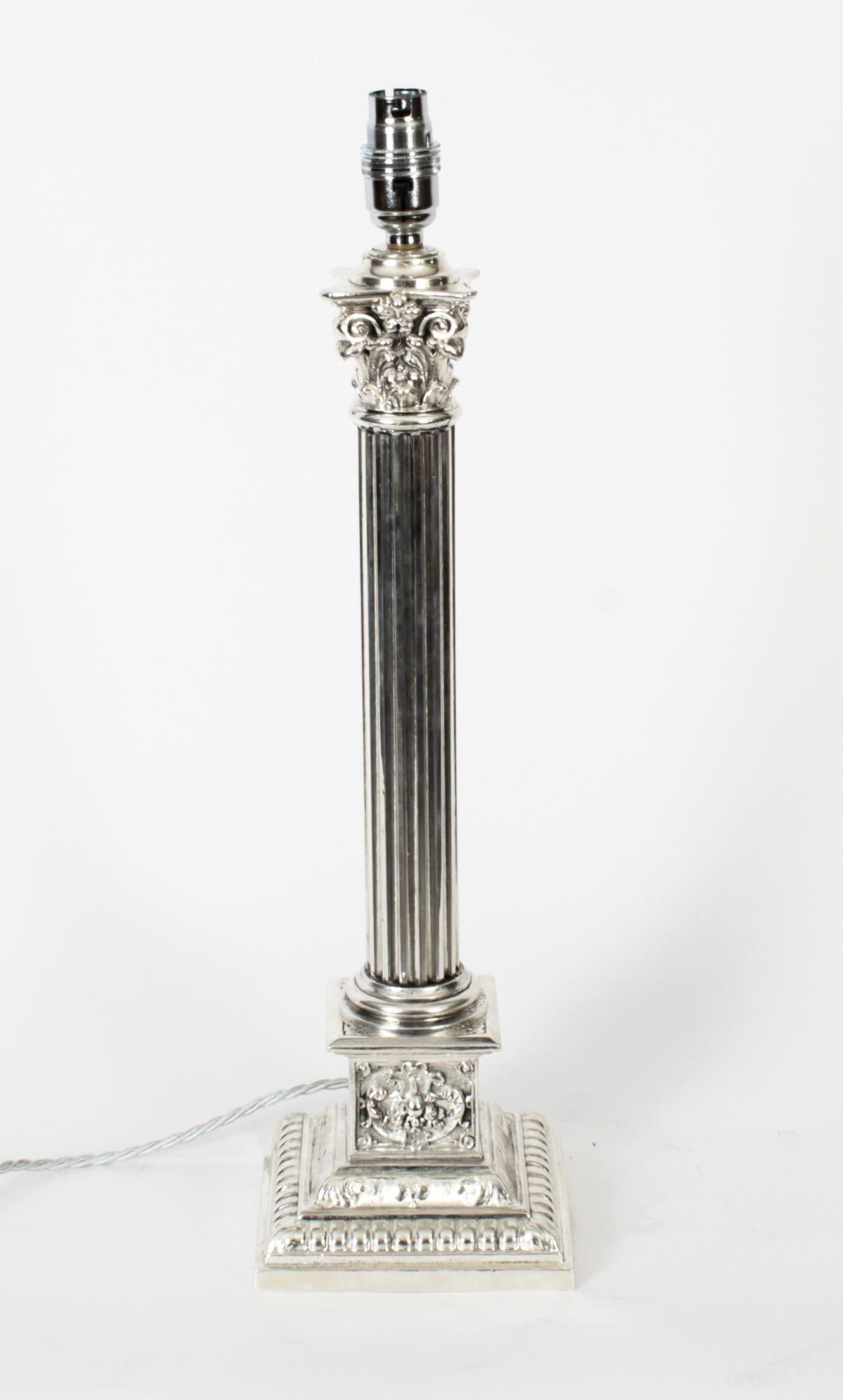 This is a splendid antique Victorian silver-plated Corinthian column table lamp now converted to electricity, late 19th century in date.
 
This opulent antique table lamp features a Corinthian Capital decorated with classical ornate foliage in the