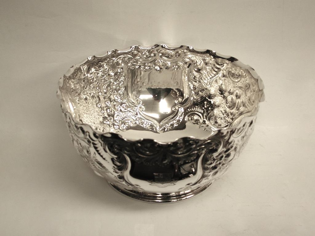 Antique Victorian silver plated embossed rose bowl dated circa 1890, Maker :-Henry Atkins of Sheffield
Heavy quality bowl, probably won as a prize at Eton College.
There is the Coat of Arms of Eton College engraved in one of the cartouches on the