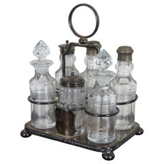 https://a.1stdibscdn.com/antique-victorian-silver-plated-glass-cruet-condiment-set-monogrammed-caddy-for-sale/1121189/f_225445221613670487168/22544522_master.jpg?width=240