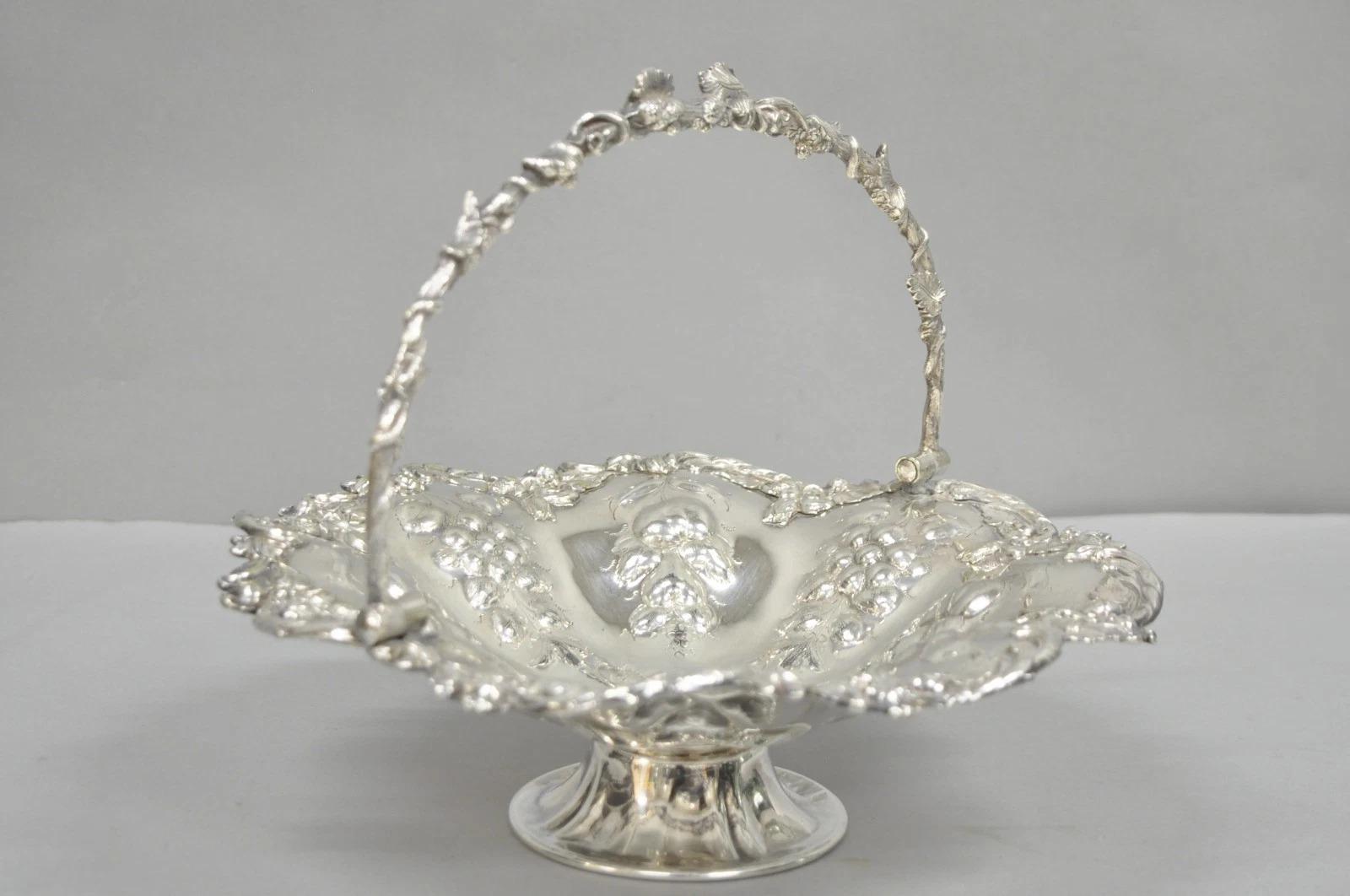 Antique Victorian Silver Plated Grapevine Repousse Dessert Basket Fruit Bowl with Ornate Handle. Circa Early 20th Century. Measurements: 4