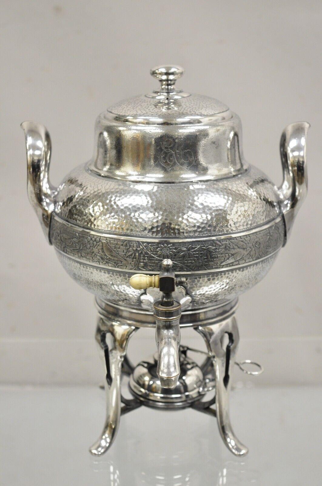 Antique Victorian Silver Plated Hand Hammered Samovar Coffee Pot Warmer. Item. Item features monogram letters to front (illegible), very nice antique Samovar. Circa Early 1900's. Measurements: 13